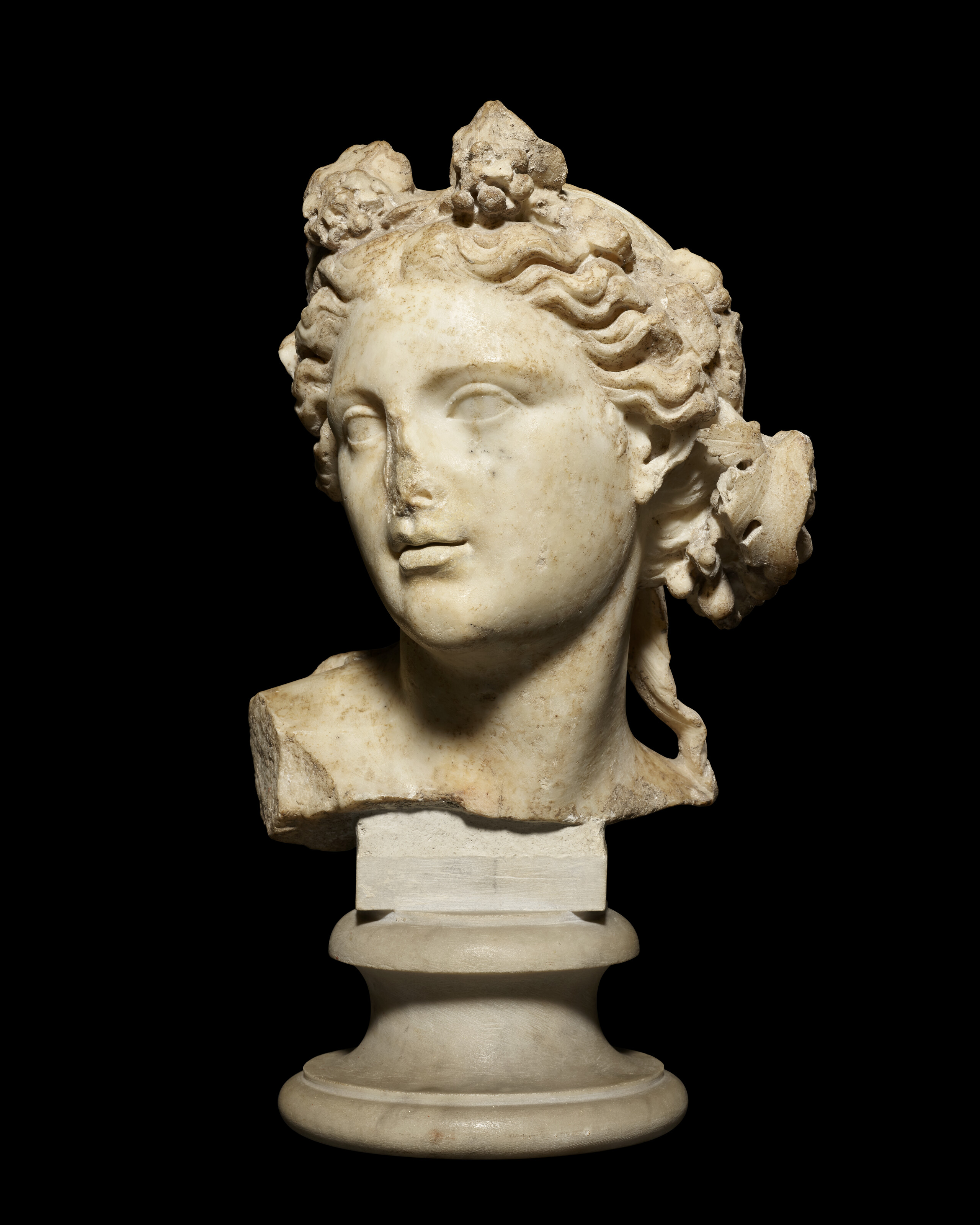 A Roman marble head of a Maenad, circa 2nd century A.D., offered in Antiquities on 2 July 2025 at Christie's in London