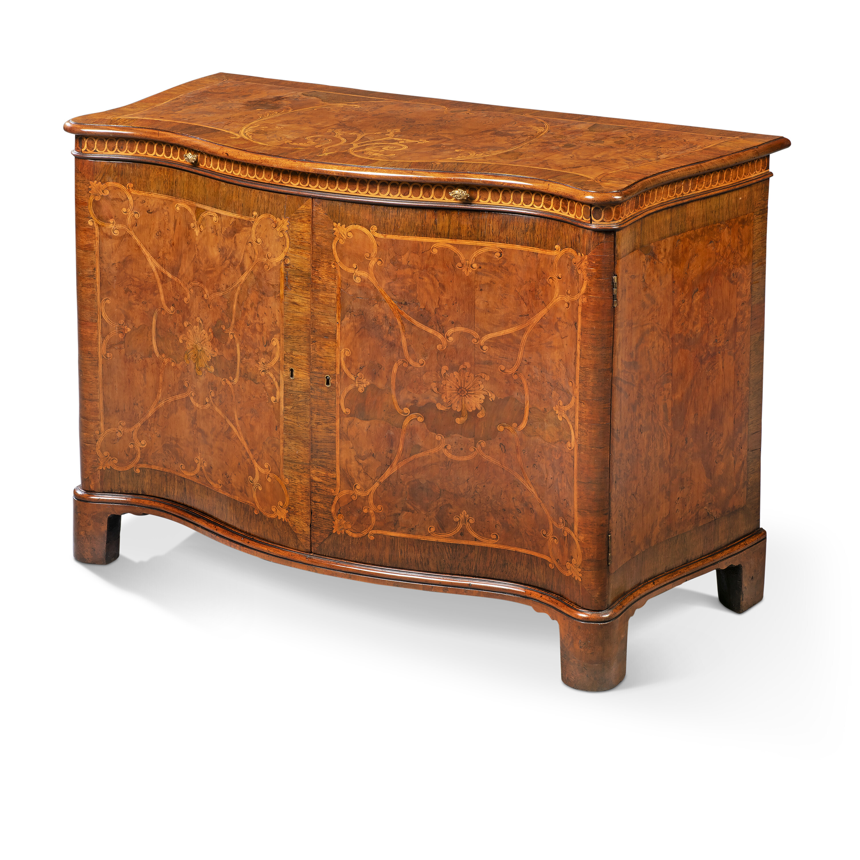 A GEORGE III YEW-WOOD, PADOUK AND MARQUETRY COMMODE, ATTRIBUTED TO INCE ...