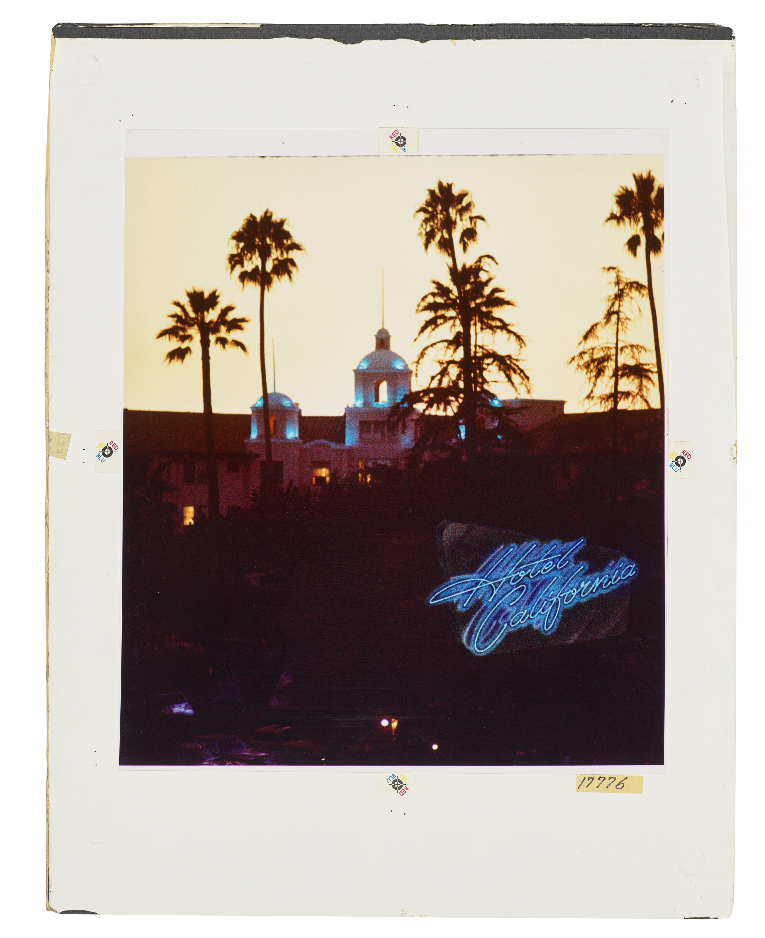 'The sun was setting and the traffic was rushing by and I had no time. So I just started shooting. No planning, nothing. But it was perfect.' David Alexander's photograph of the Beverly Hills Hotel for the front cover of Hotel California. The neon logo is by John Kosh, who had designed Abbey Road for The Beatles