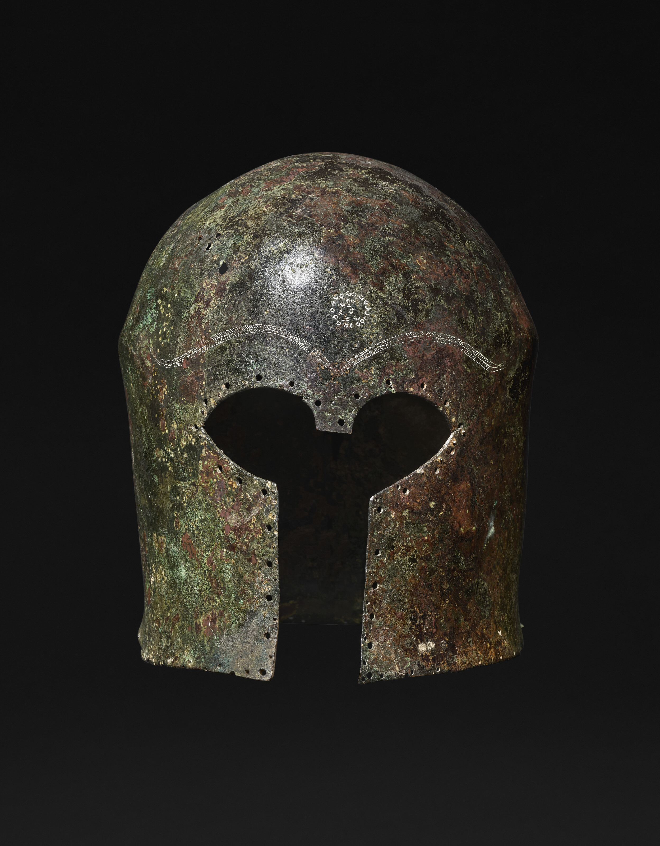 A Greek bronze Corinthian helmet, Archaic period, circa 650-600 B.C., offered in Antiquities on 3 December 2025 at Christie's in London
