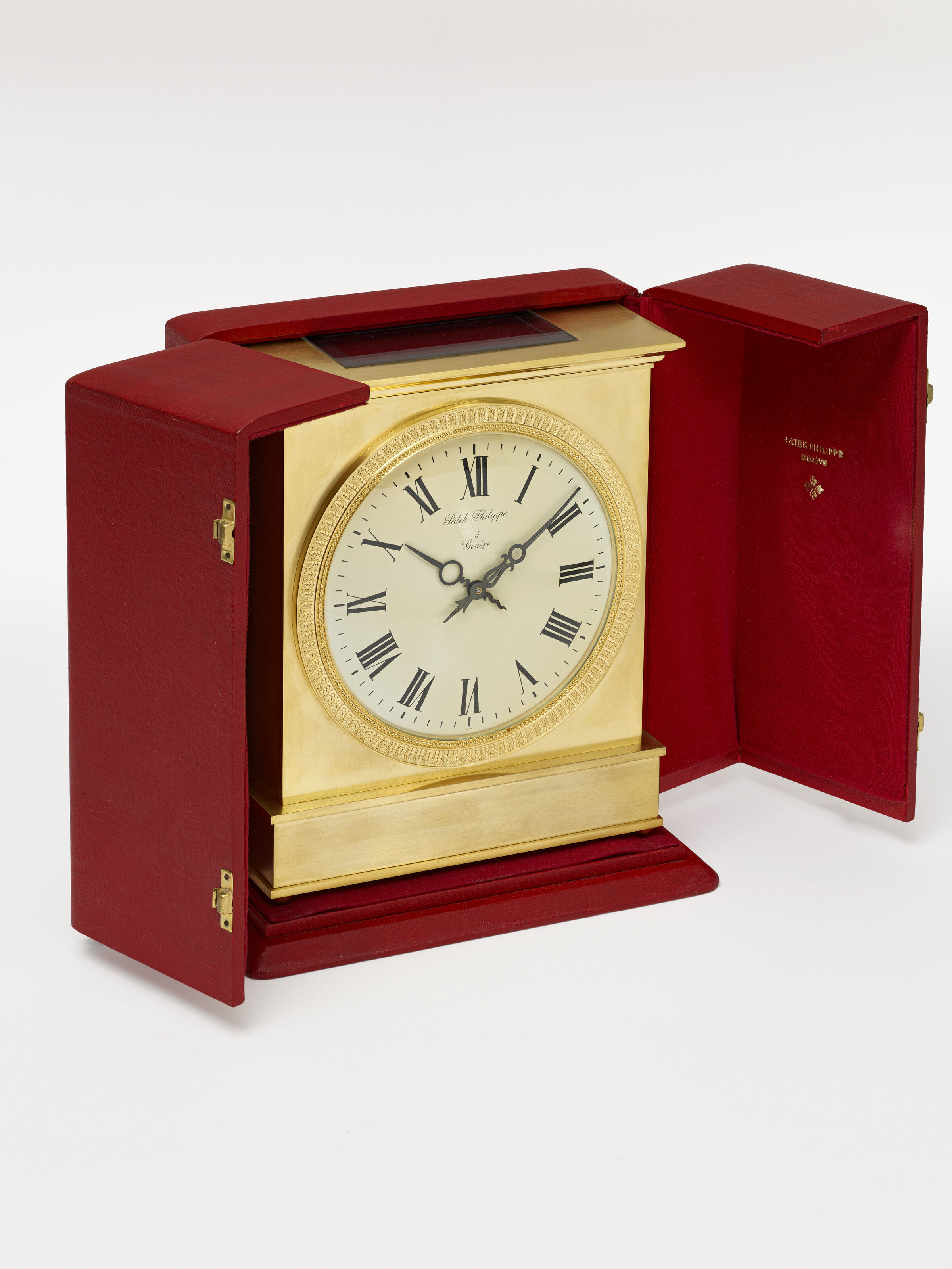 PATEK PHILIPPE, GILDED BRASS SOLAR DESK CLOCK, CASE NO: 1765