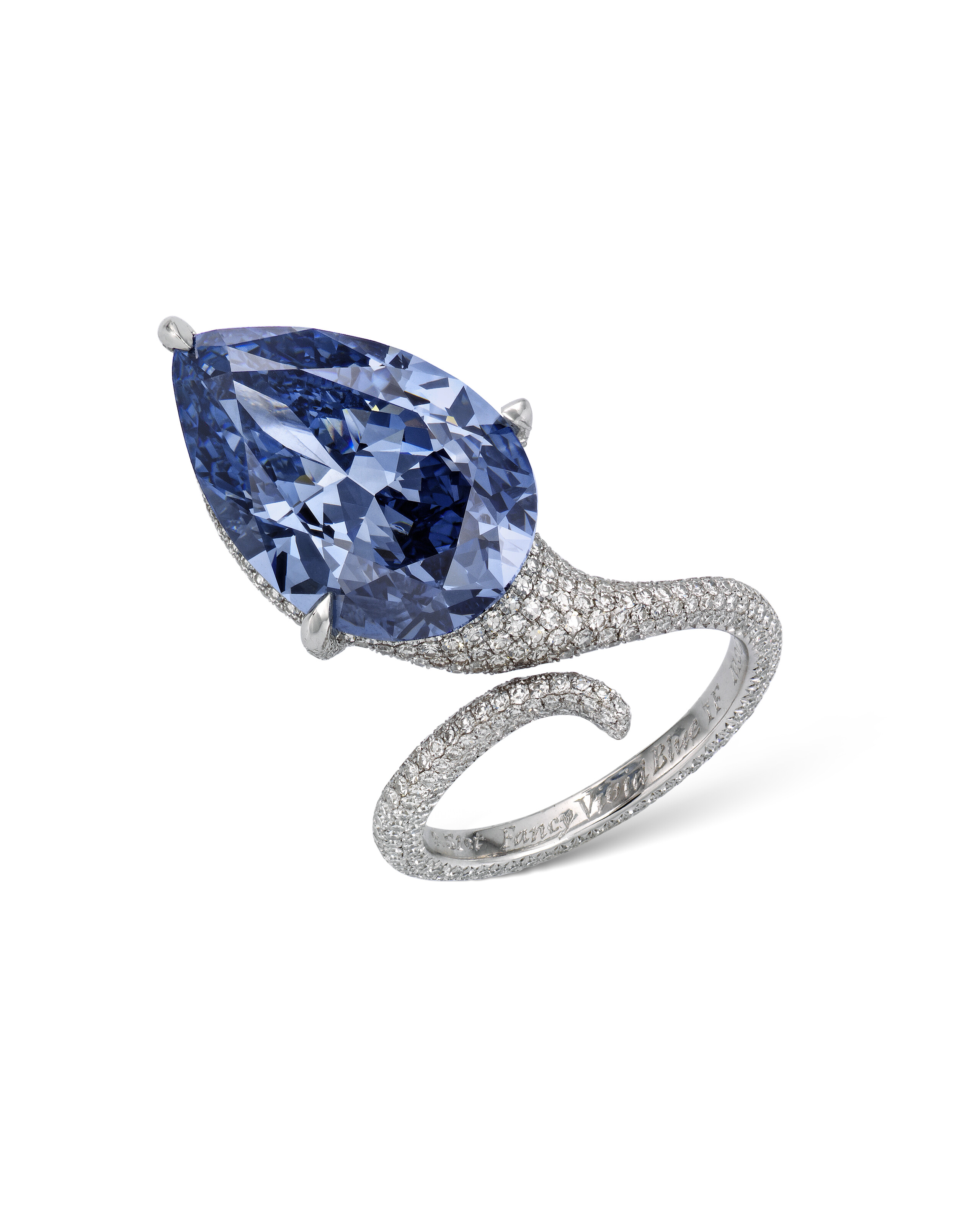 After its sale in 2014, the Mellon Blue was retouched to improve its clarity and reset in a serpentine pave ring engraved with the words 'Fancy Vivid Blue'
