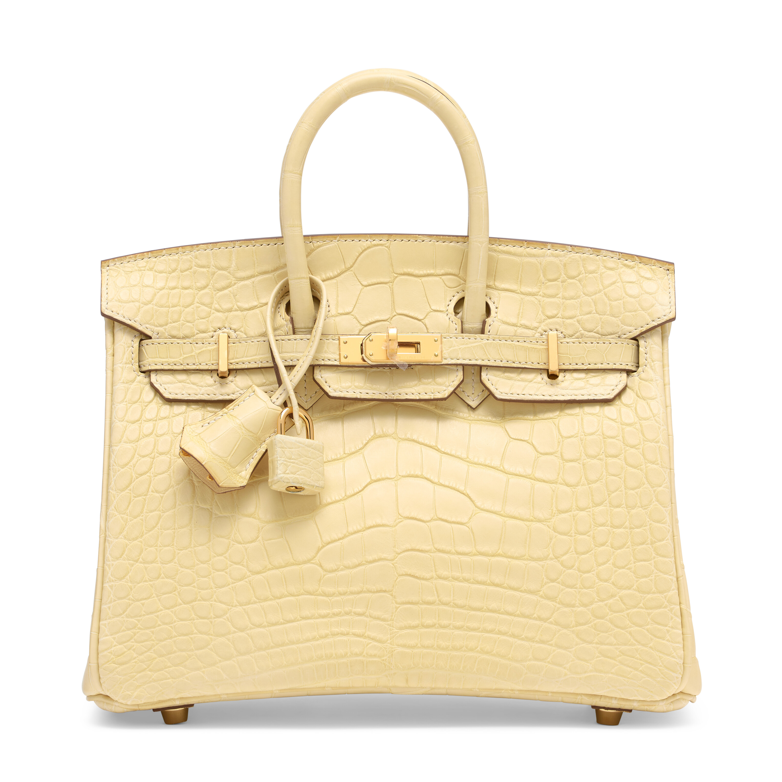 雾面香草色短吻鳄皮25公分柏金包附黄金配件，爱马仕，2024年。25 x 19 x 14 公分。估价：港元 350,000 –450,000。此拍品将于2025年11月24日在佳士得香港典雅传承: 手袋及配饰拍卖中呈献 