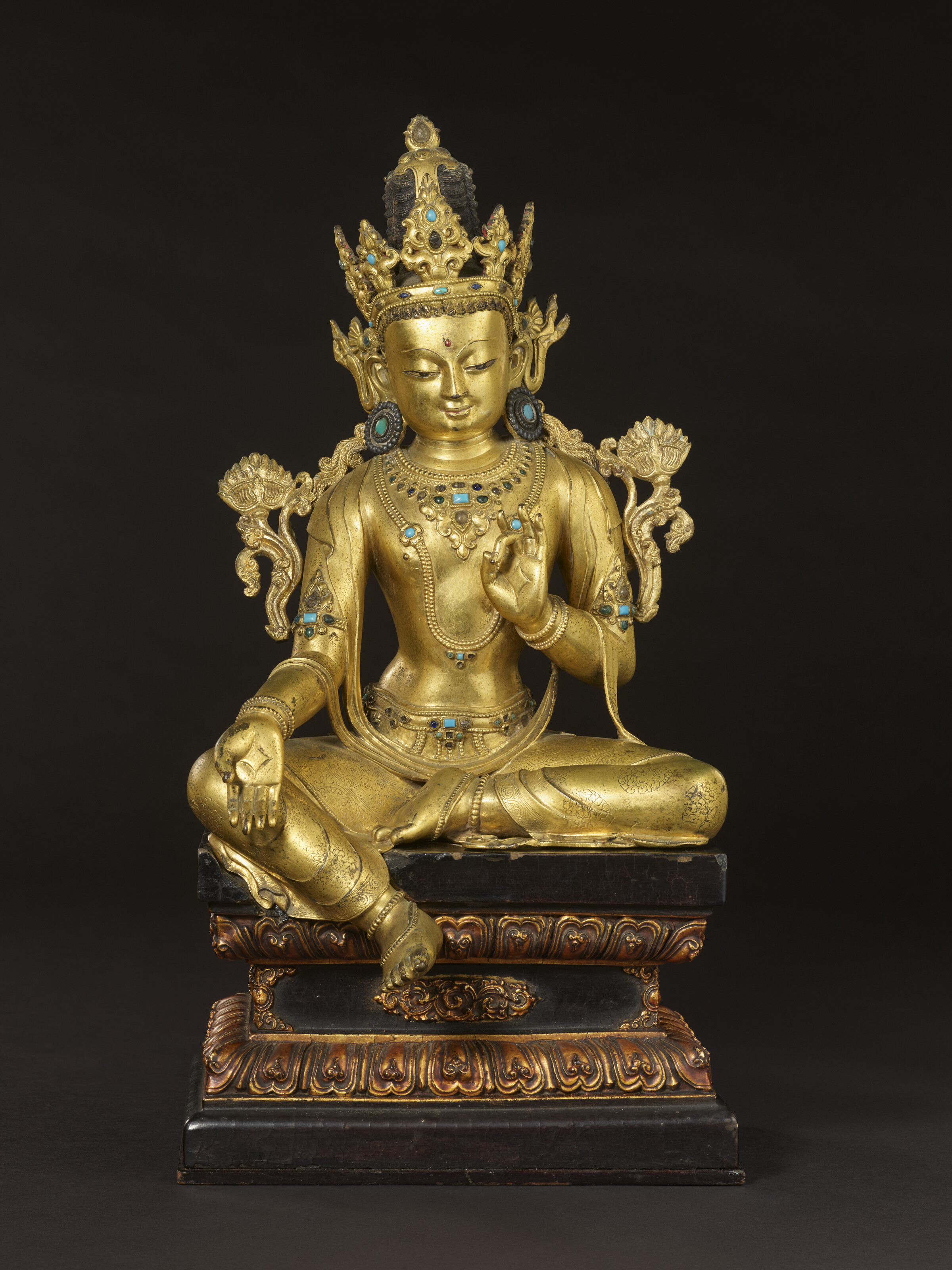 AN IMPERIAL GILT COPPER ALLOY FIGURE OF AVALOKITESHVARA