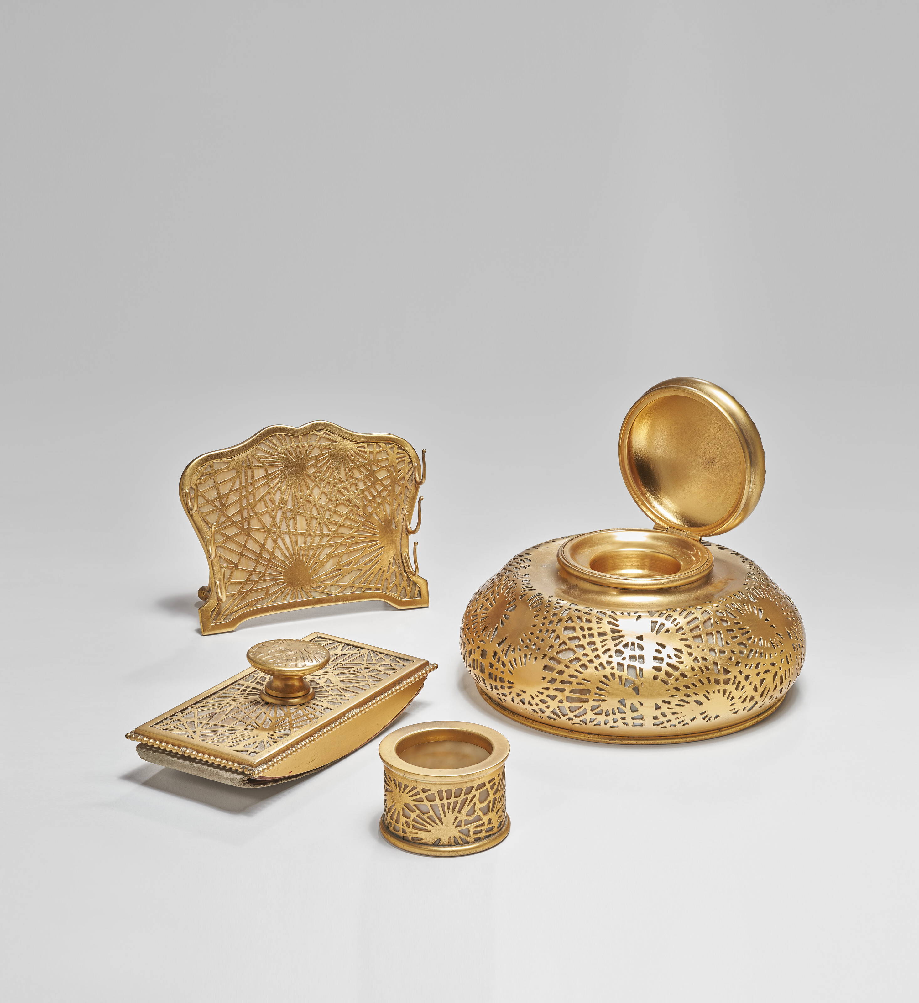 TIFFANY STUDIOS, Sixteen-Piece 'Pine Needle' Desk Set, circa 1920