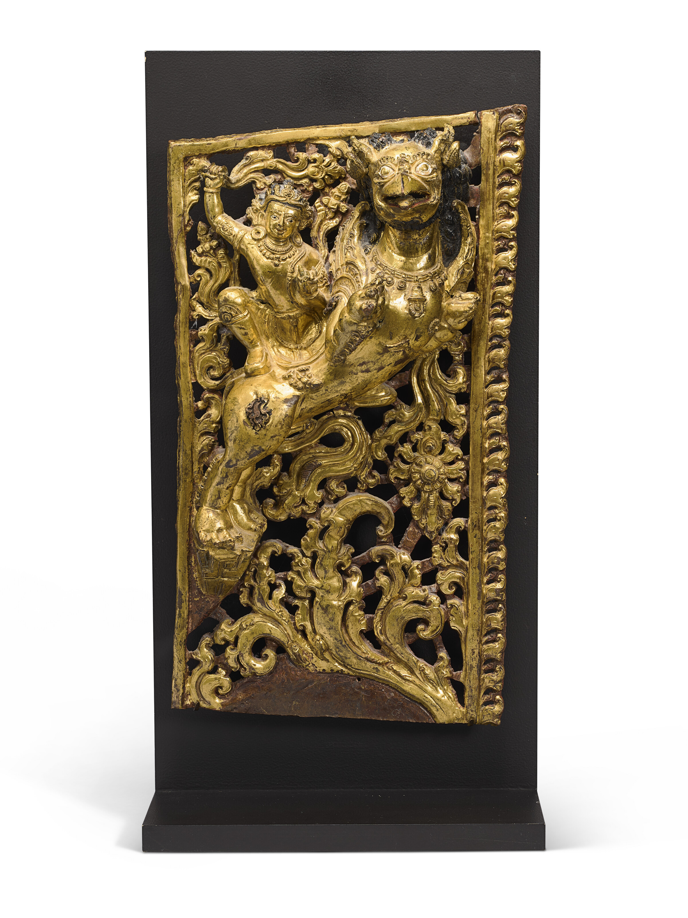 A LARGE GILT-BRONZE FIGURE OF MAITREYA, TIBET, 15TH CENTURY