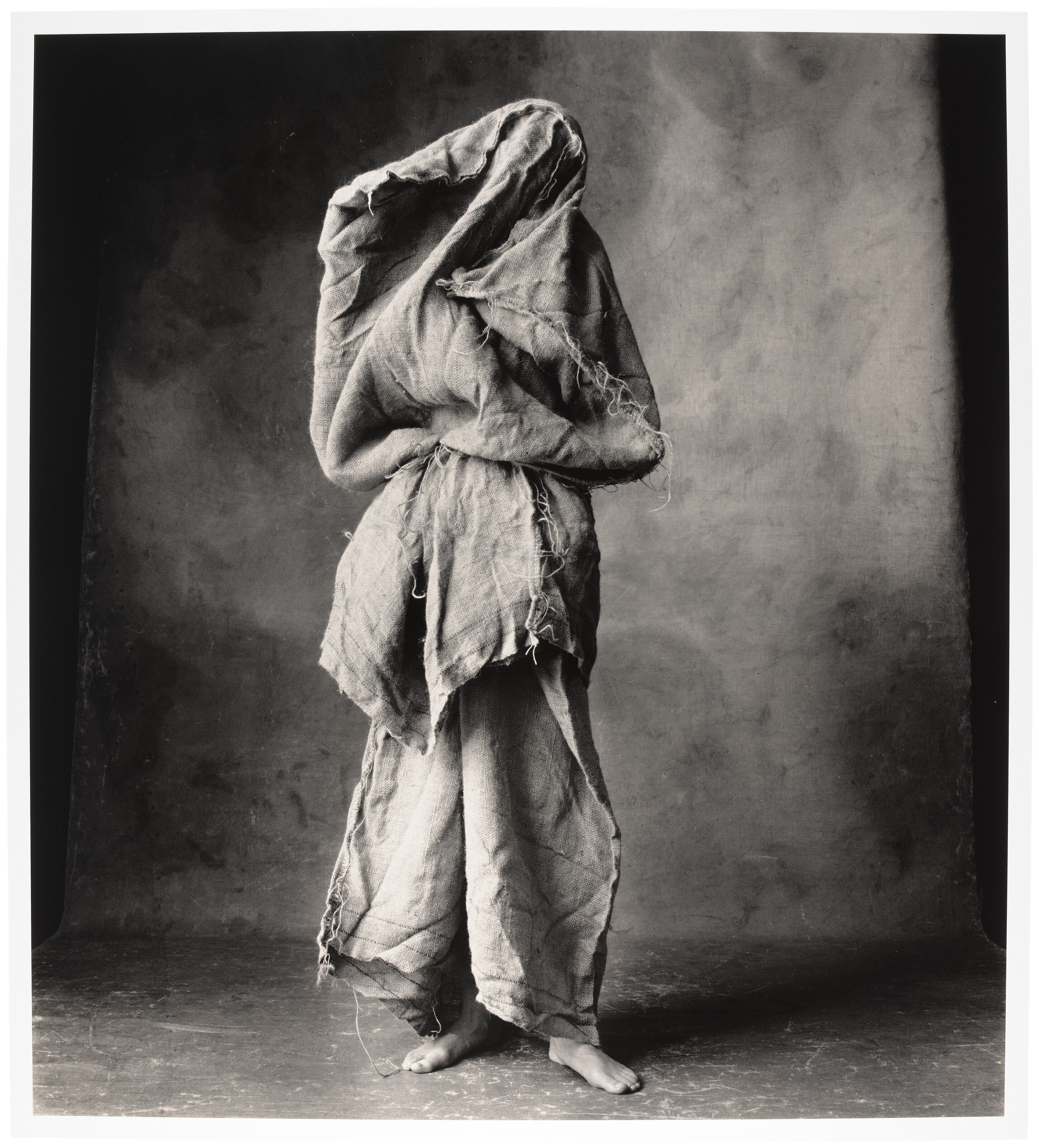 IRVING PENN (1917–2009), Woman in a Burlap Sack, New York, 2007