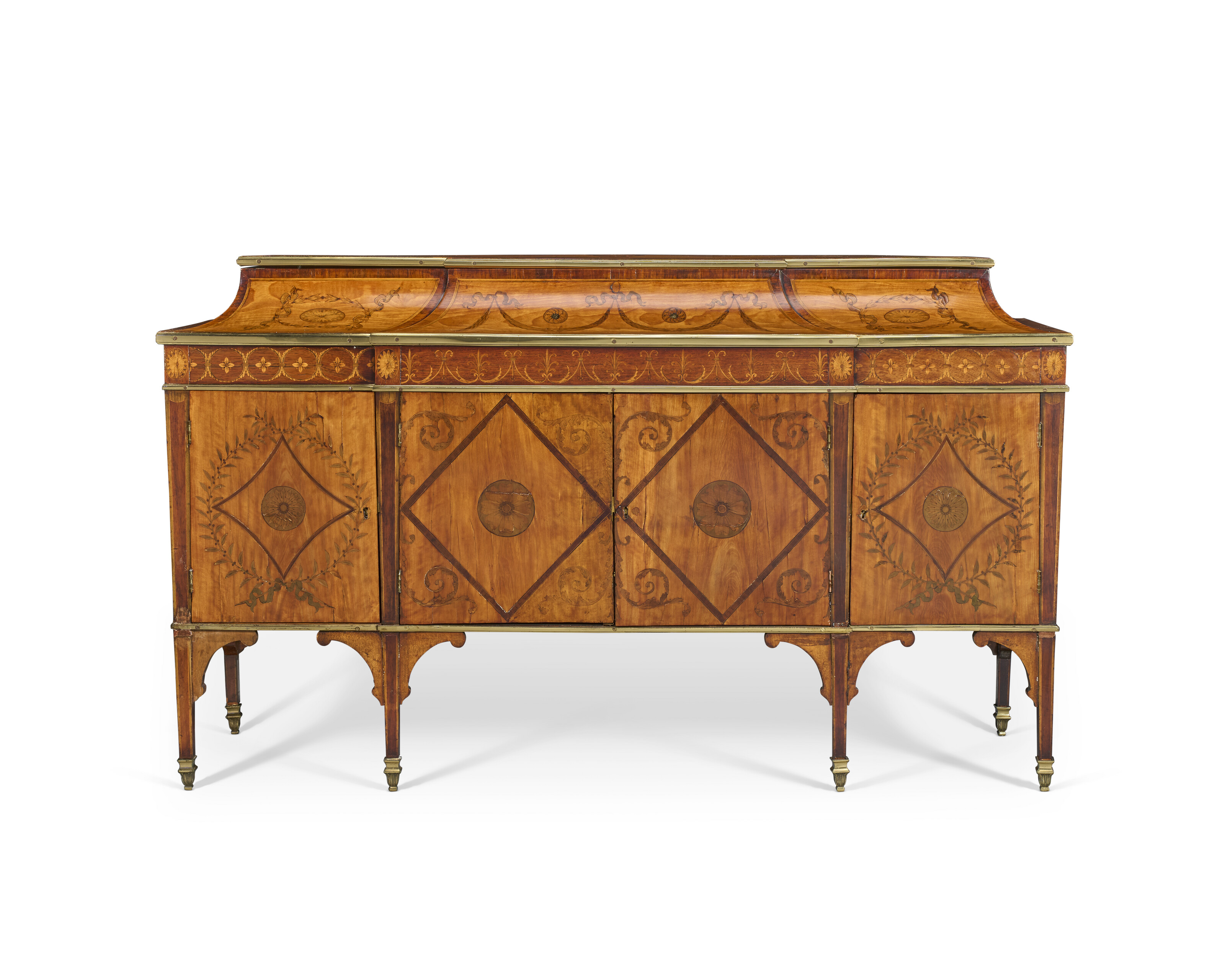 A GEORGE III BRASS-MOUNTED SATINWOOD AND MARQUETRY COMMODE, ATTRIBUTED ...