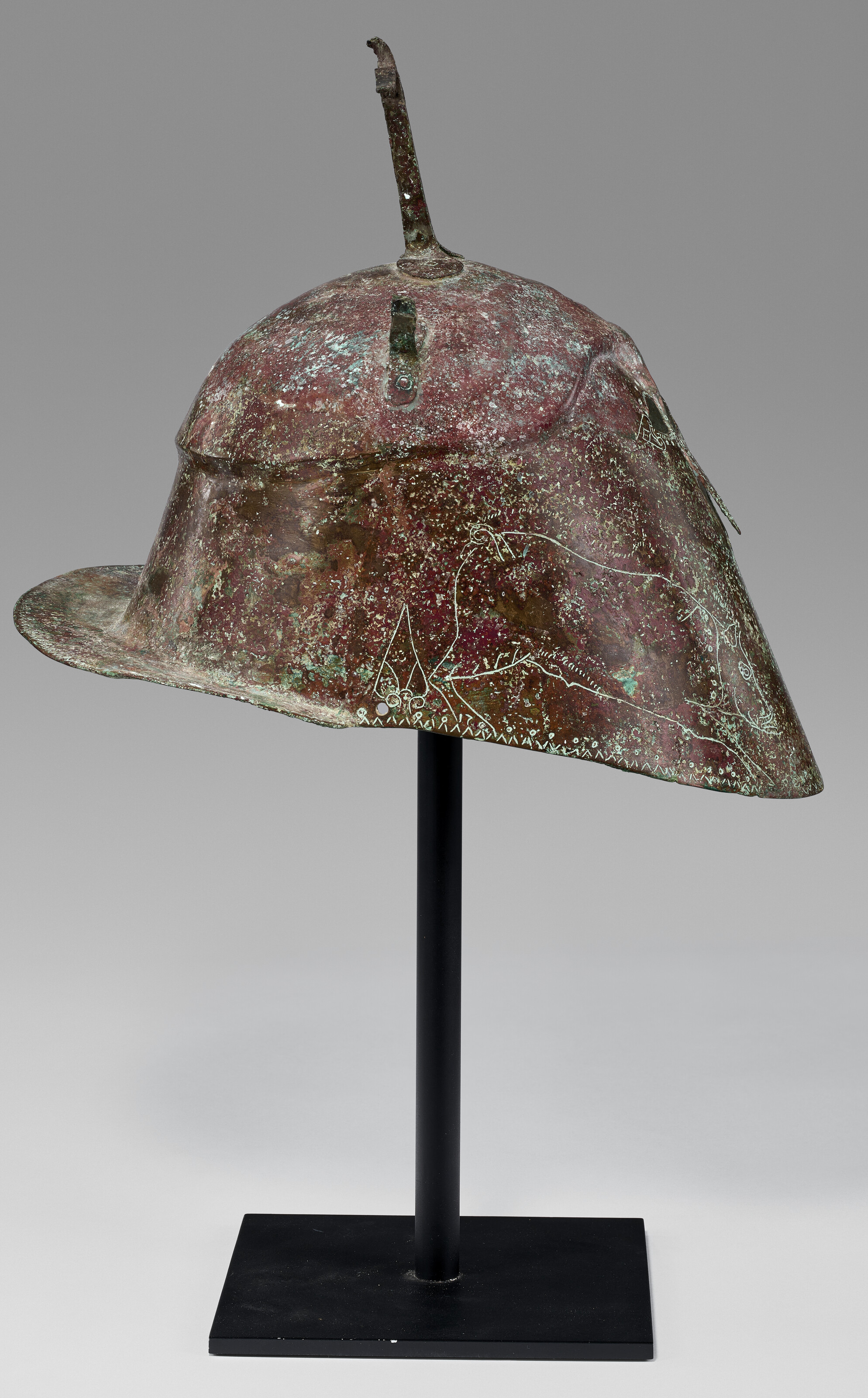 A GREEK BRONZE HELMET OF APULO-CORINTHIAN TYPE, MAGNA GRAECIA