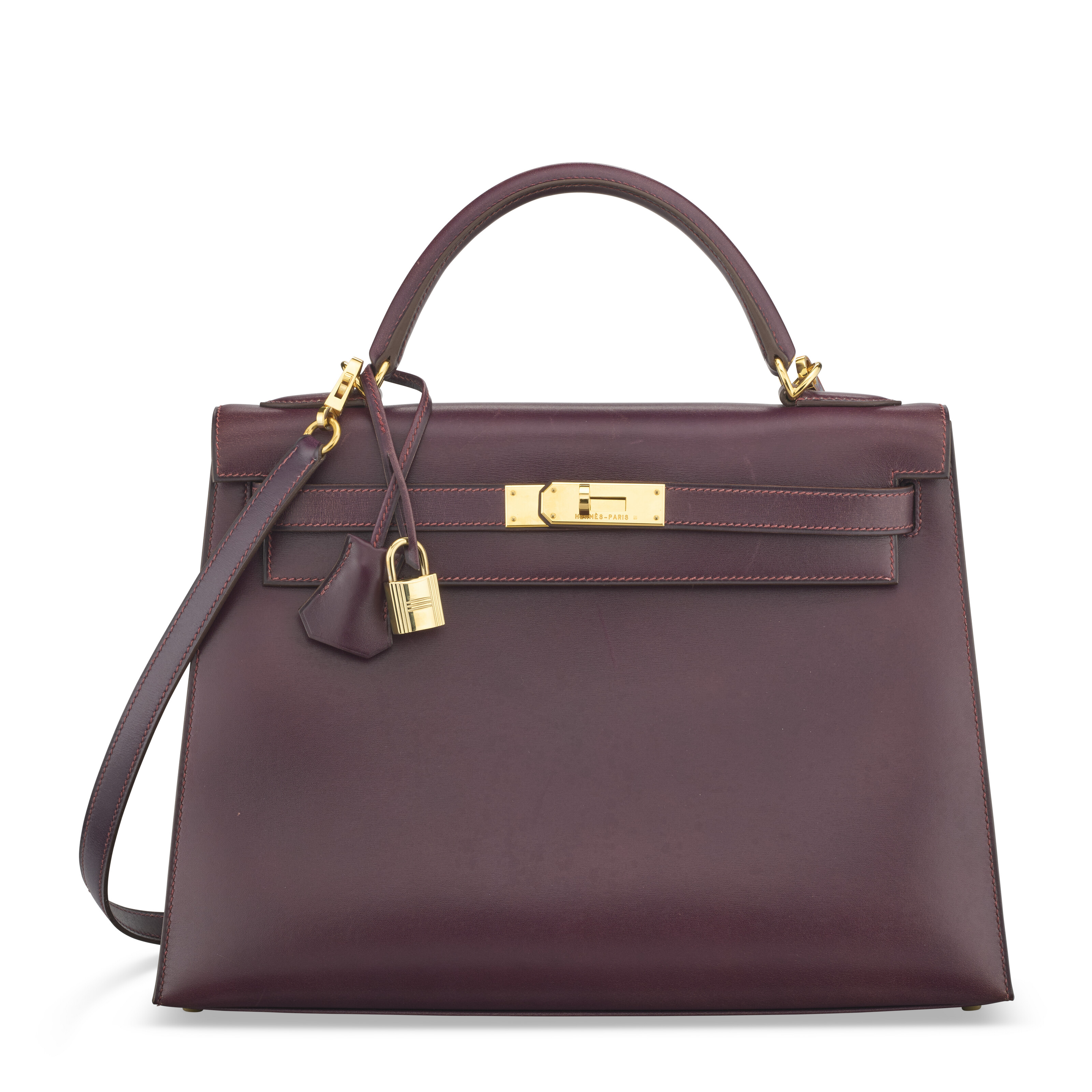 A QUETSCHE CALF BOX LEATHER SELLIER KELLY 32 WITH GOLD HARDWARE