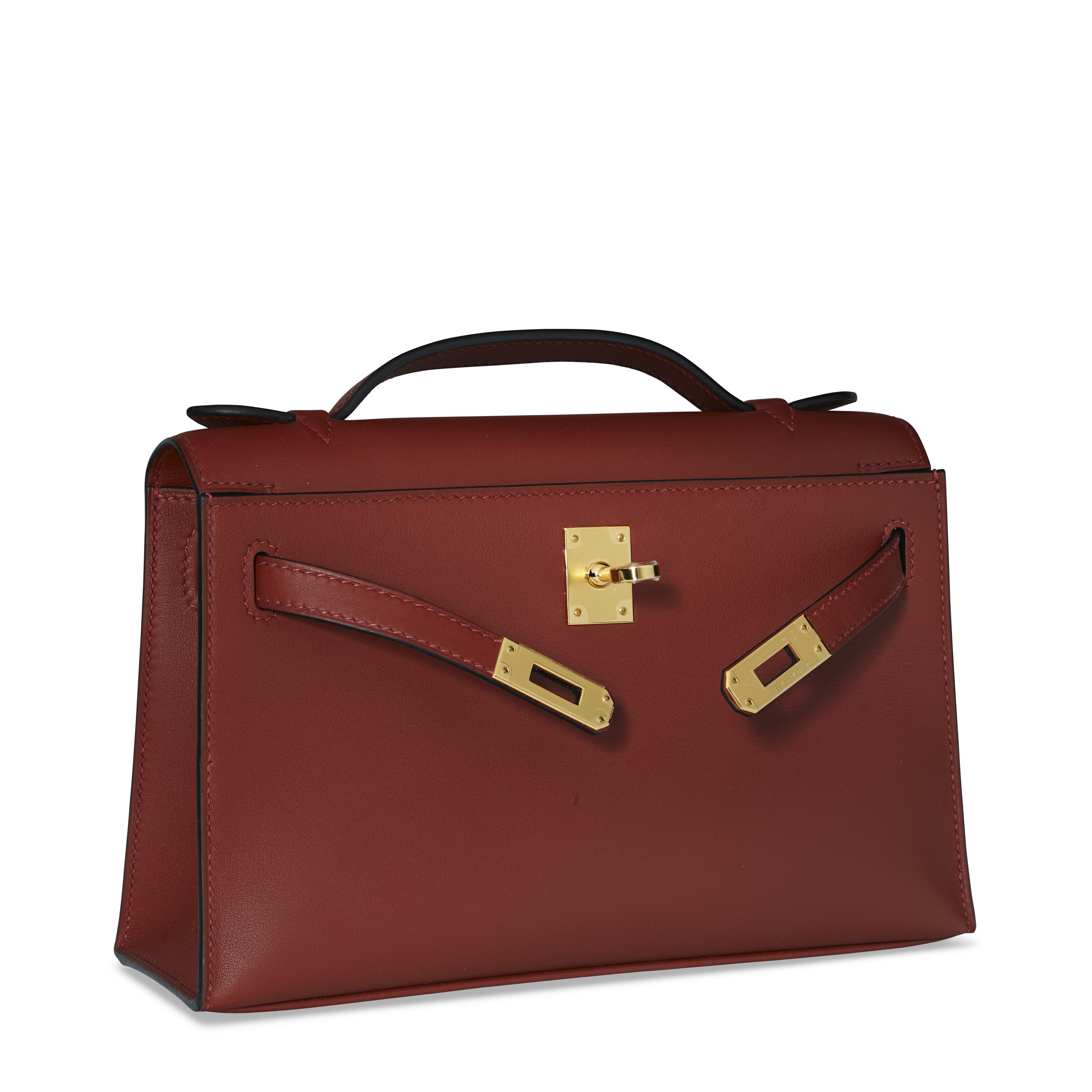 A ROUGE H SWIFT LEATHER KELLY POCHETTE WITH GOLD HARDWARE, HERMÈS