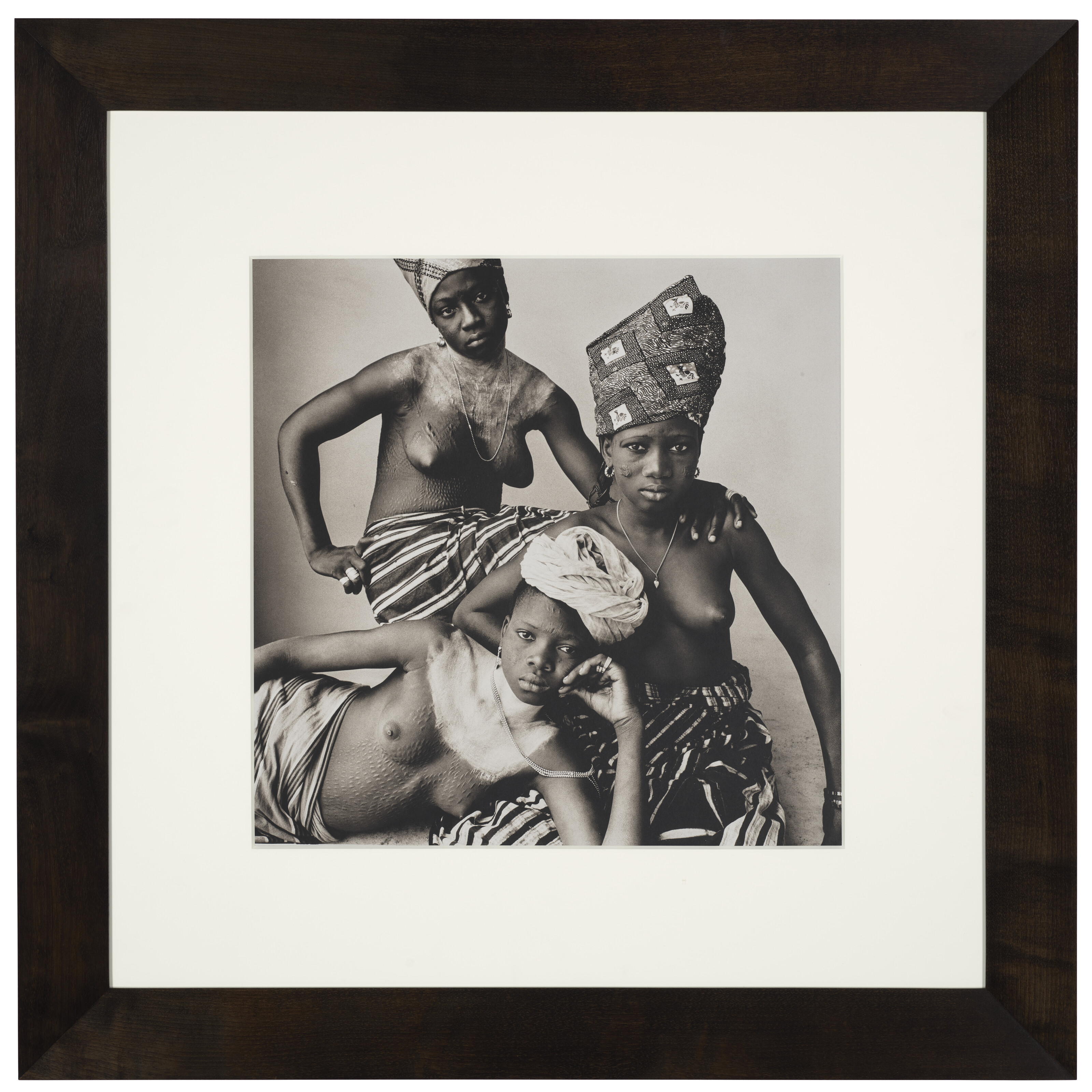 IRVING PENN (1917-2009), Three Dahomey Girls, One Reclining, 1967 