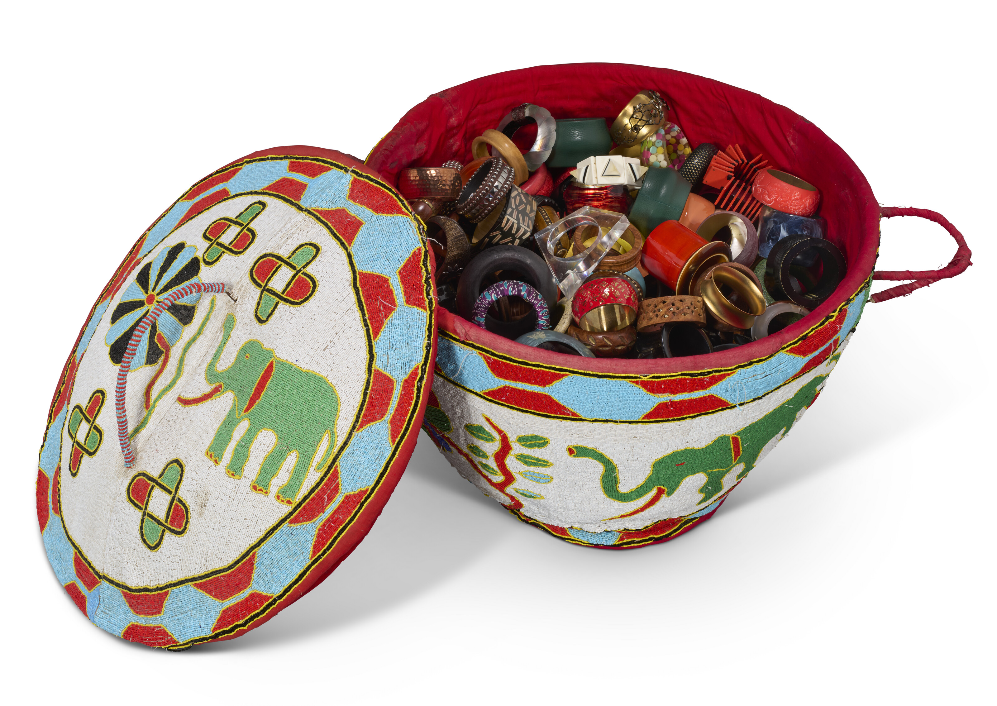 A LARGE BEADED BASKET OF BANGLES, 20TH/21ST CENTURY | Christie’s