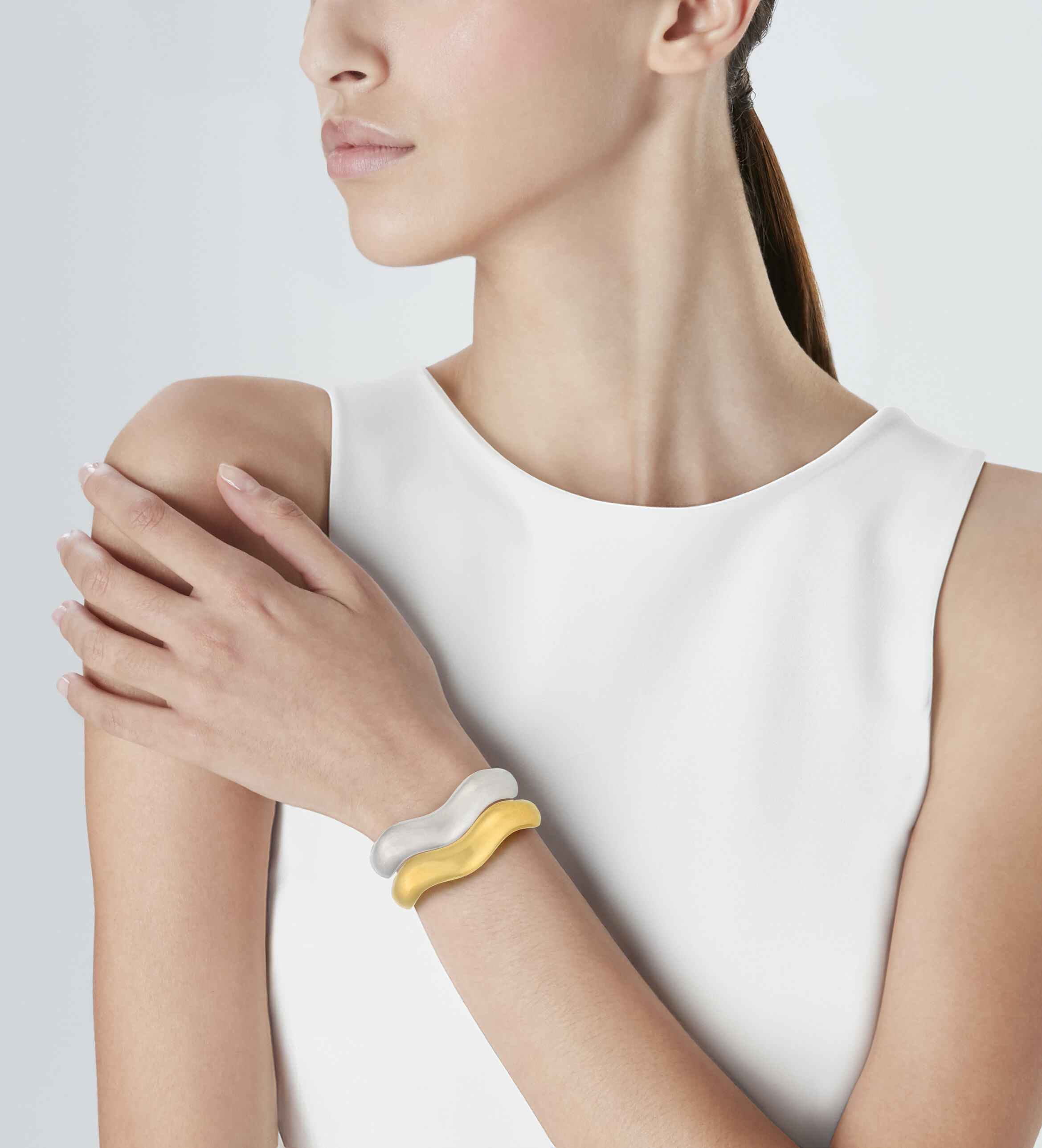 BELPERRON PAIR OF GOLD AND WHITE GOLD 'WAVE' CUFF BRACELETS image 2
