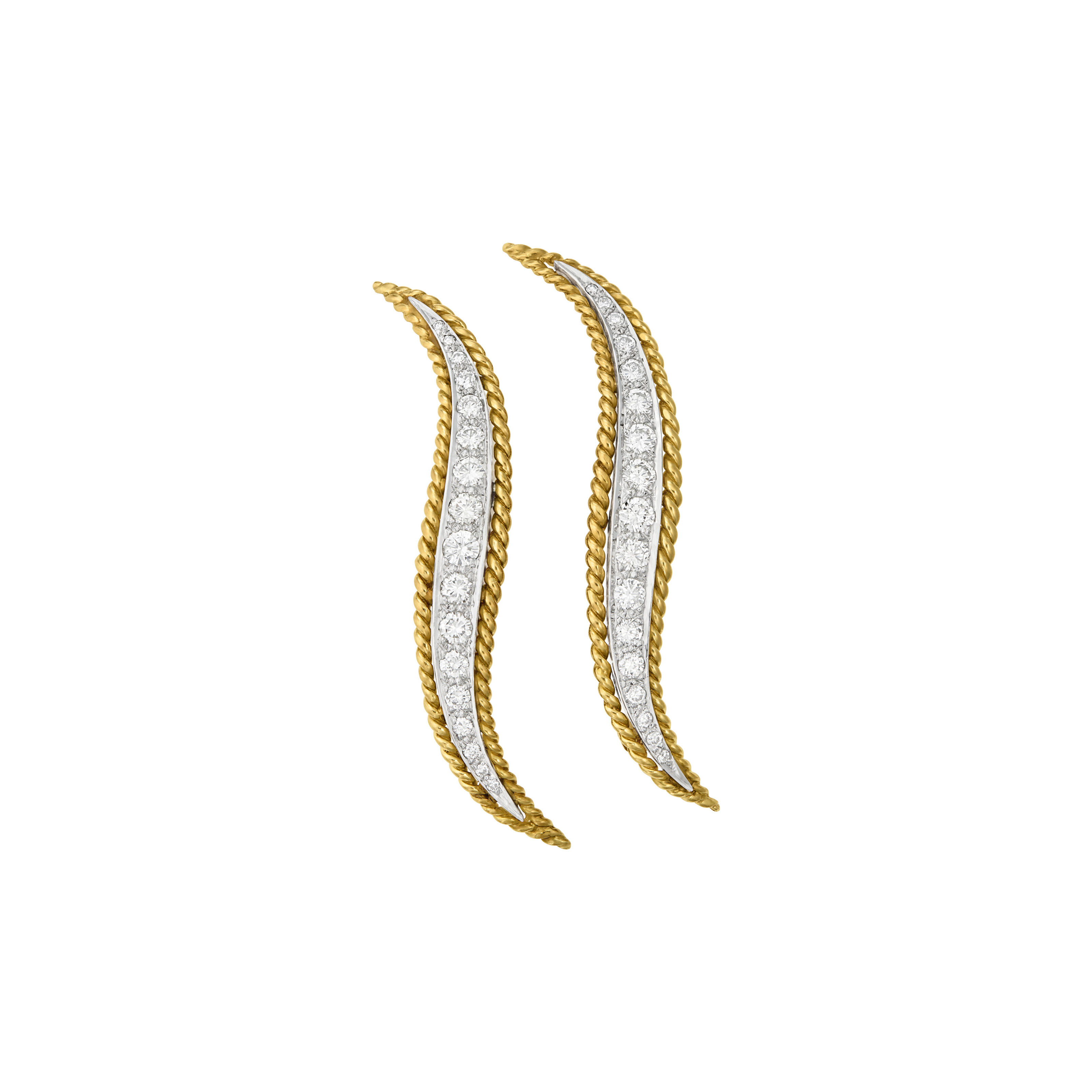VAN CLEEF & ARPELS PAIR OF DIAMOND AND GOLD 'FLAME' BROOCHES