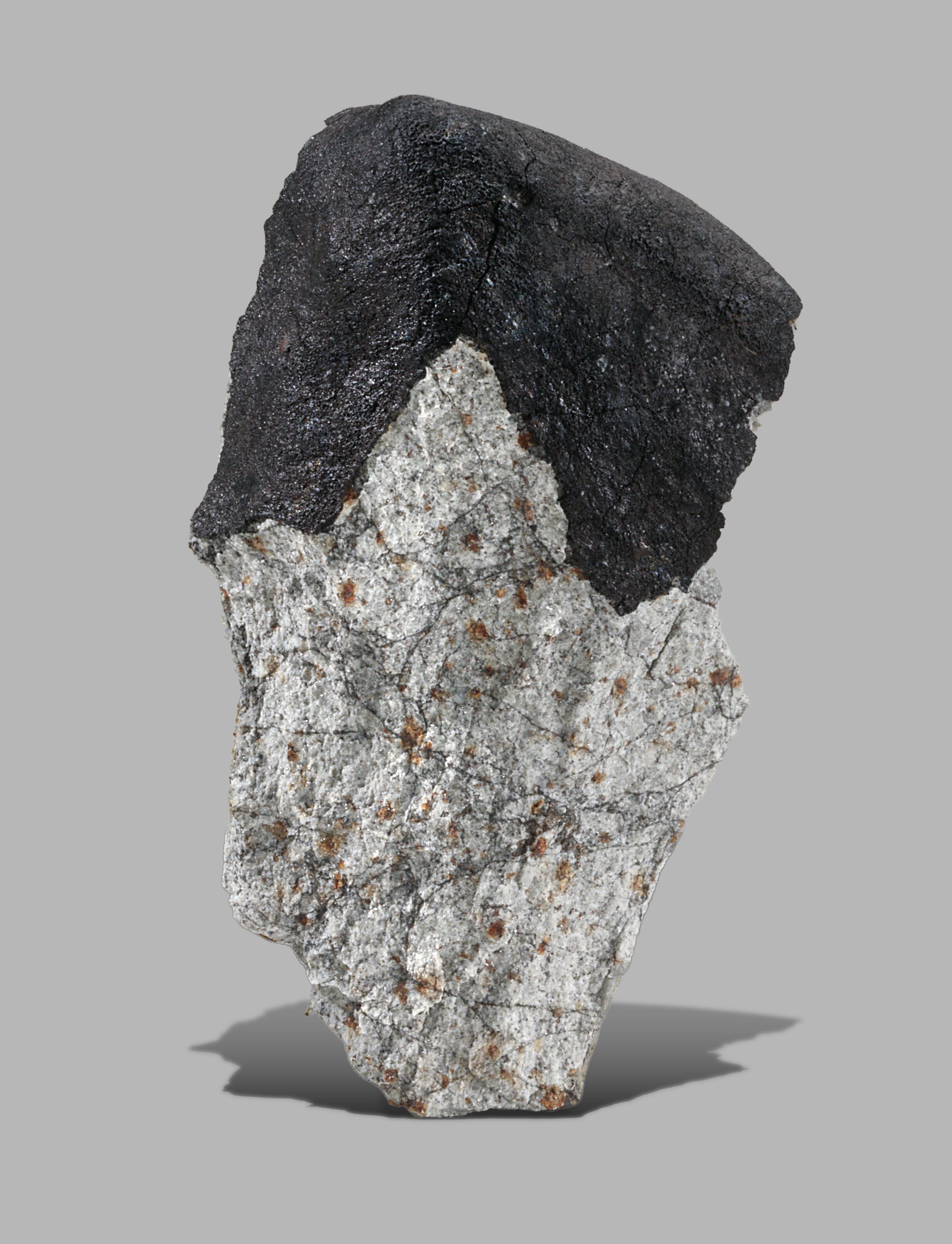 From asteroid 2023 CX1, the Saint-Pierre-Le-Viger meteorite. Chondrite - L5-6; Seine-Maritime, Normandy, France (49°49.255'N, 0°49.584'E), offered in Skybreakers: Between Heaven and Earth until 12 December 2025 at Christie’s Online