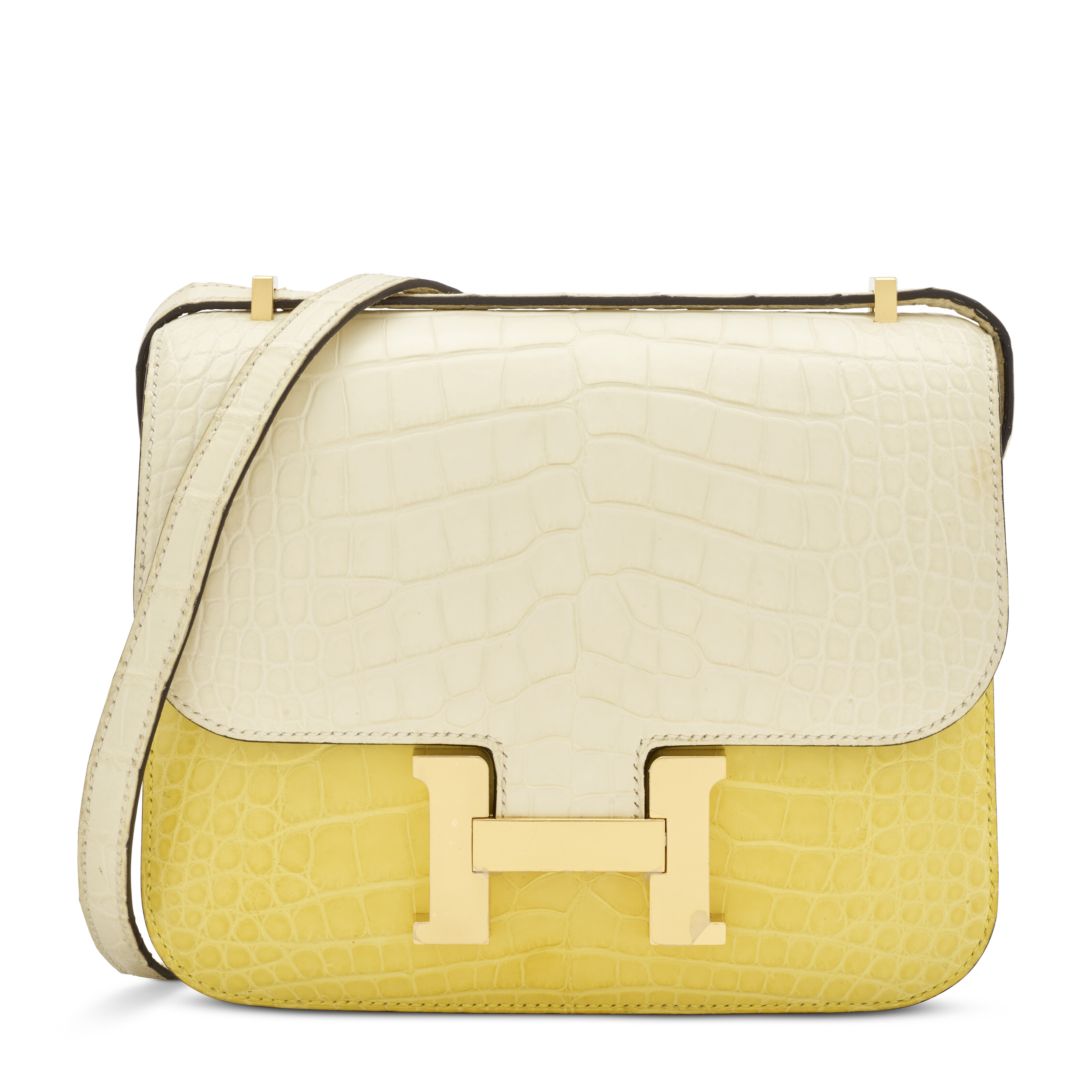 Hermes. A limited edition Matte Craie and Mimosa alligator Mini Constance 18 with gold hardware, 2023, offered in Handbags: The Paris Edit until 13 November 2025 at Christie's Online