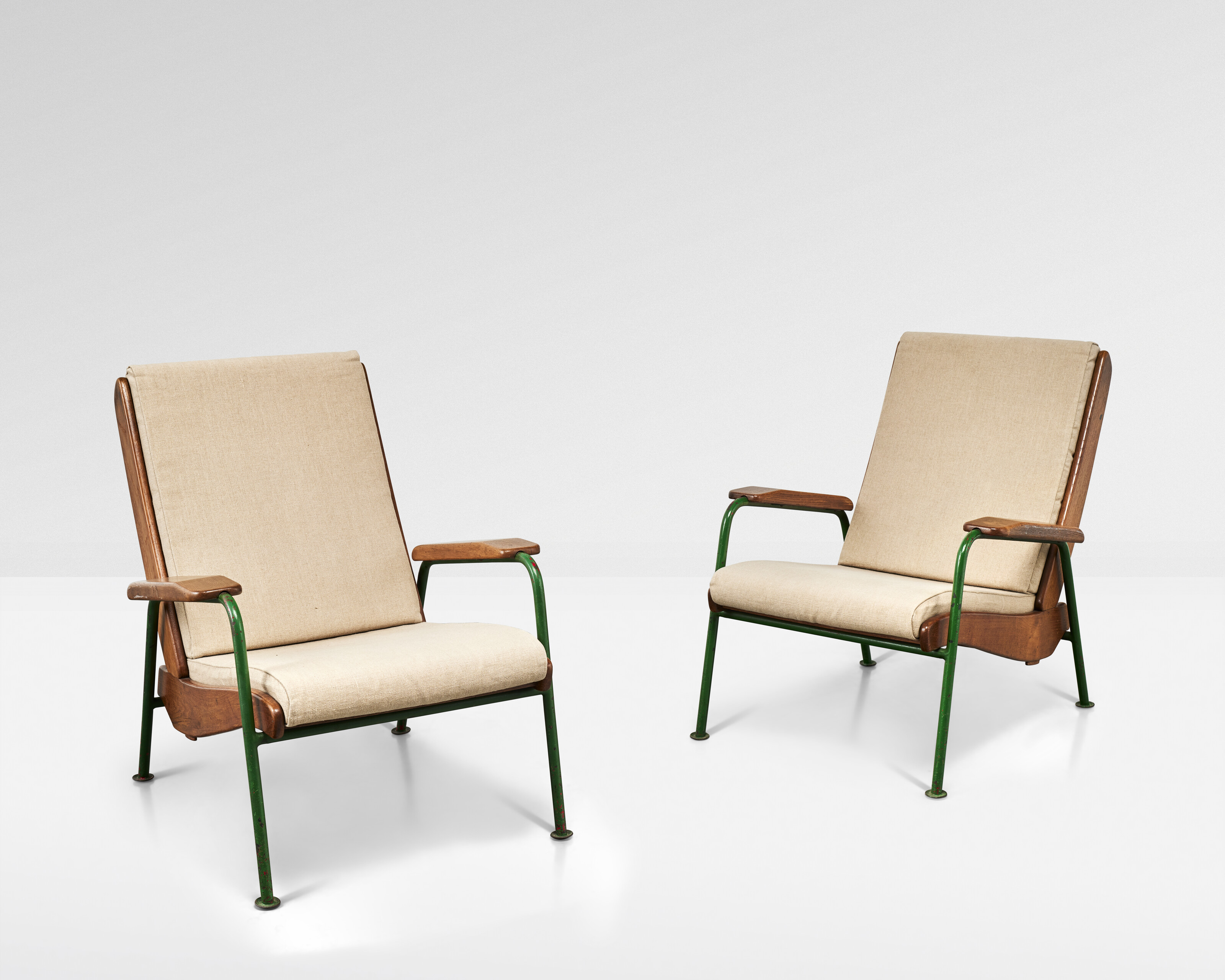 Jean Prouve, a pair of Visiteur armchairs, circa 1945, offered in Design on 21 May 2025 at Christie's in Paris