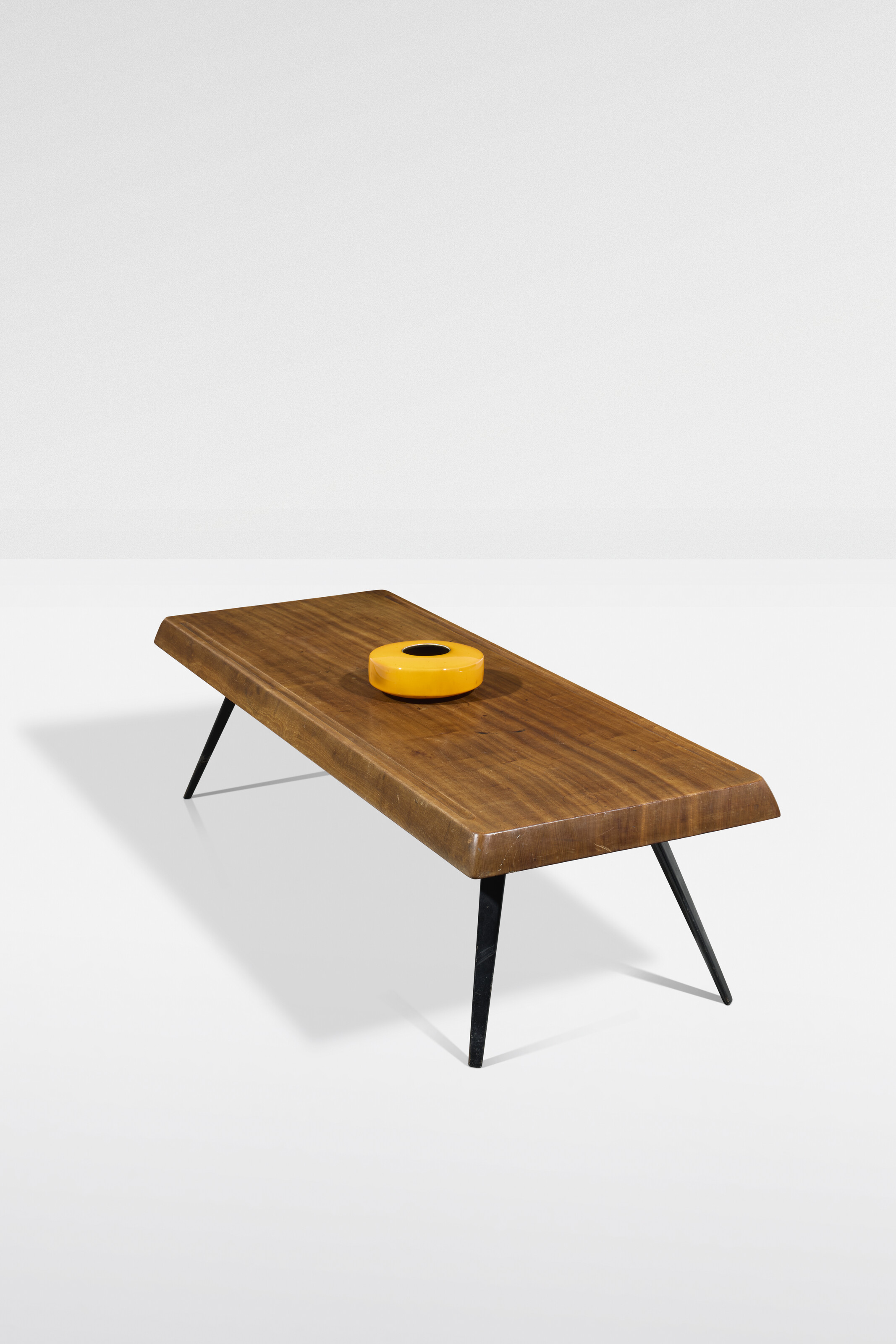 Charlotte Perriand, coffee table, circa 1953, with a Georges Jouve, Oursin vase, circa 1960, both offered in Design on 21 May 2025 at Christie's in Paris