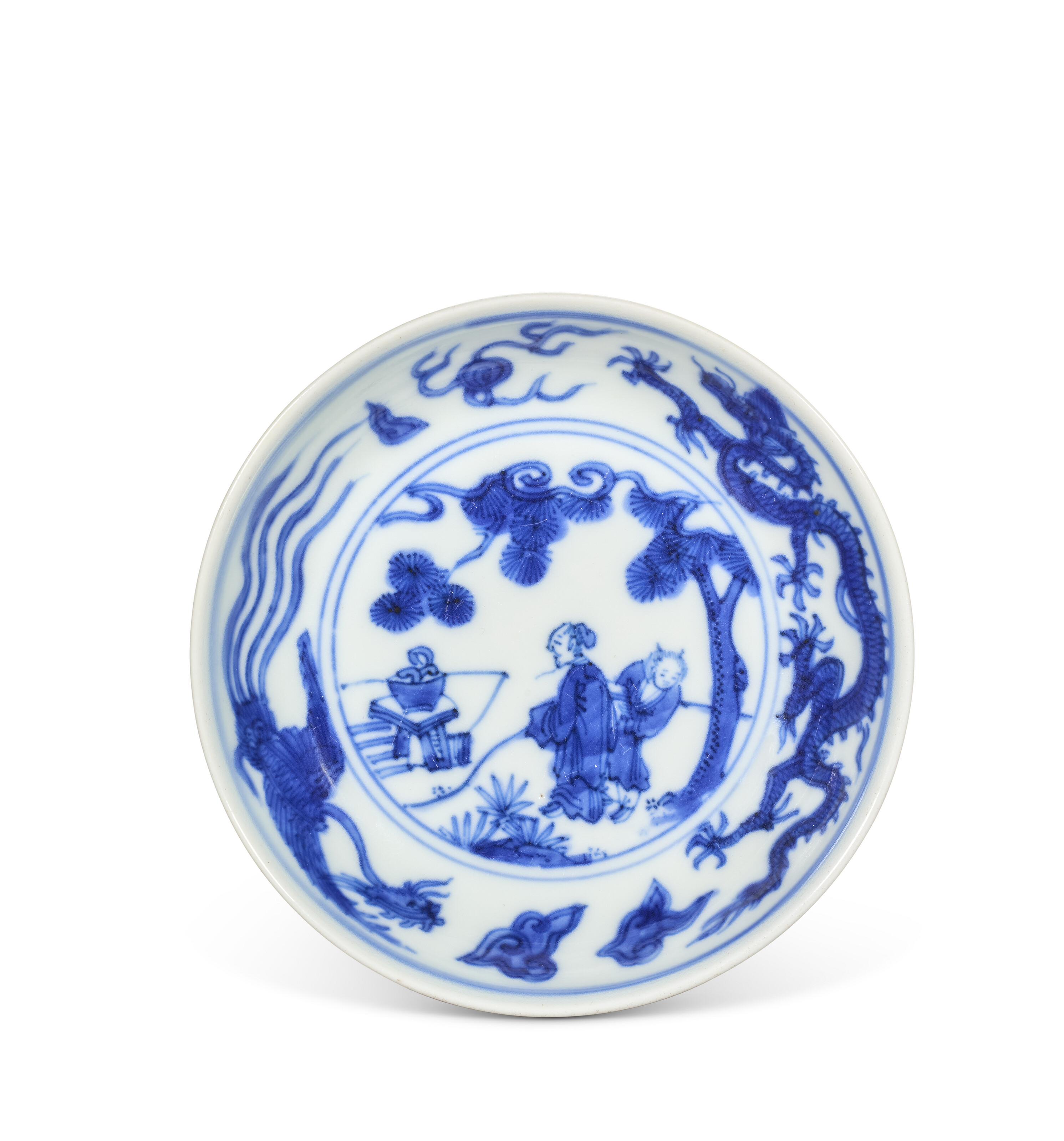 A small blue-and-white Scholar dish. China, Ming dynasty, Wanli six-character mark within a double circle in underglaze blue and of the period (1573-1619), offered in Art d'Asie on 10 June 2025 at Christie's in Paris