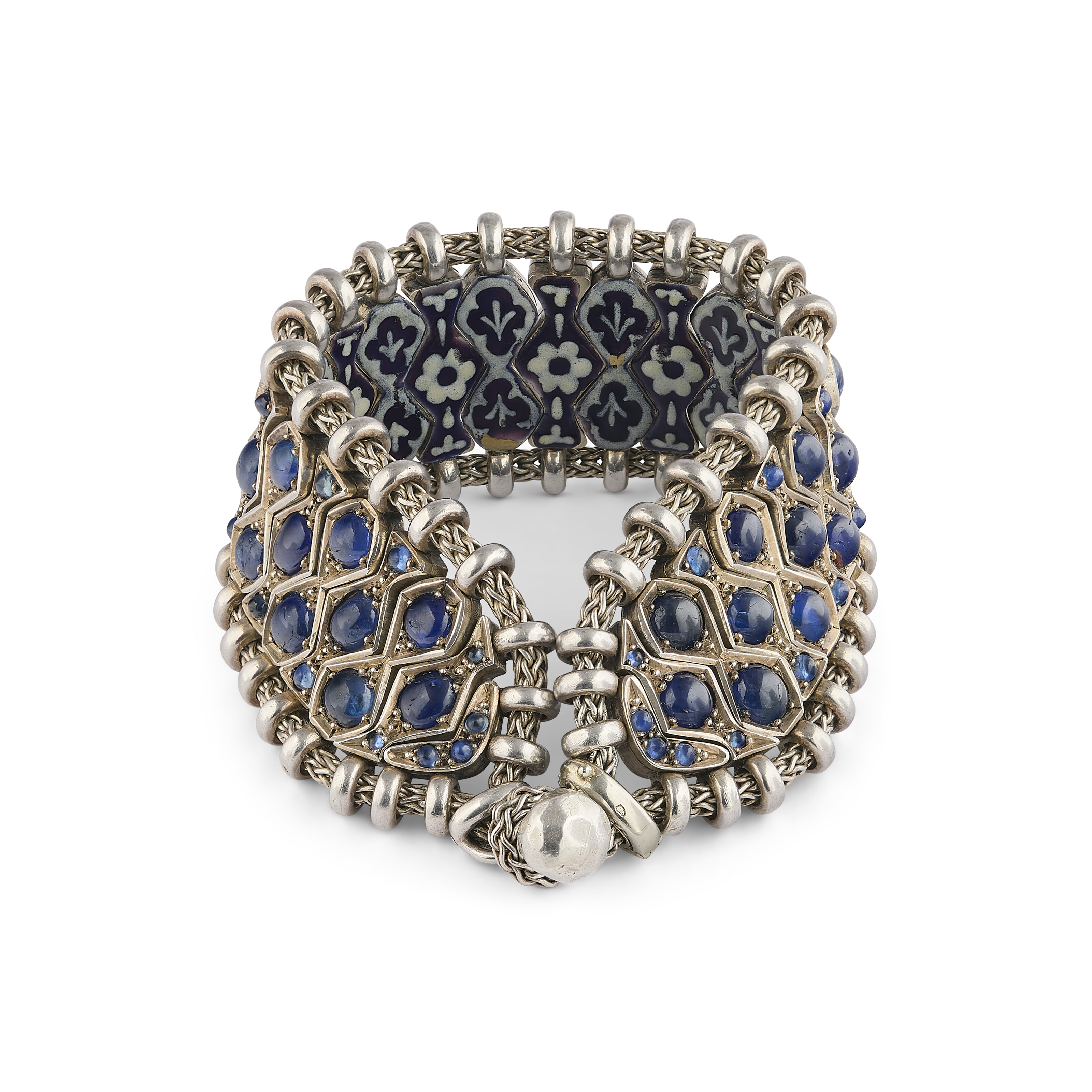 Rene Boivin. A sapphire and enamel Hindou bracelet, circa 1950, after a design by Juliette Moutard, offered in Joaillerie Paris, until 27 June 2025 at Christie's Online