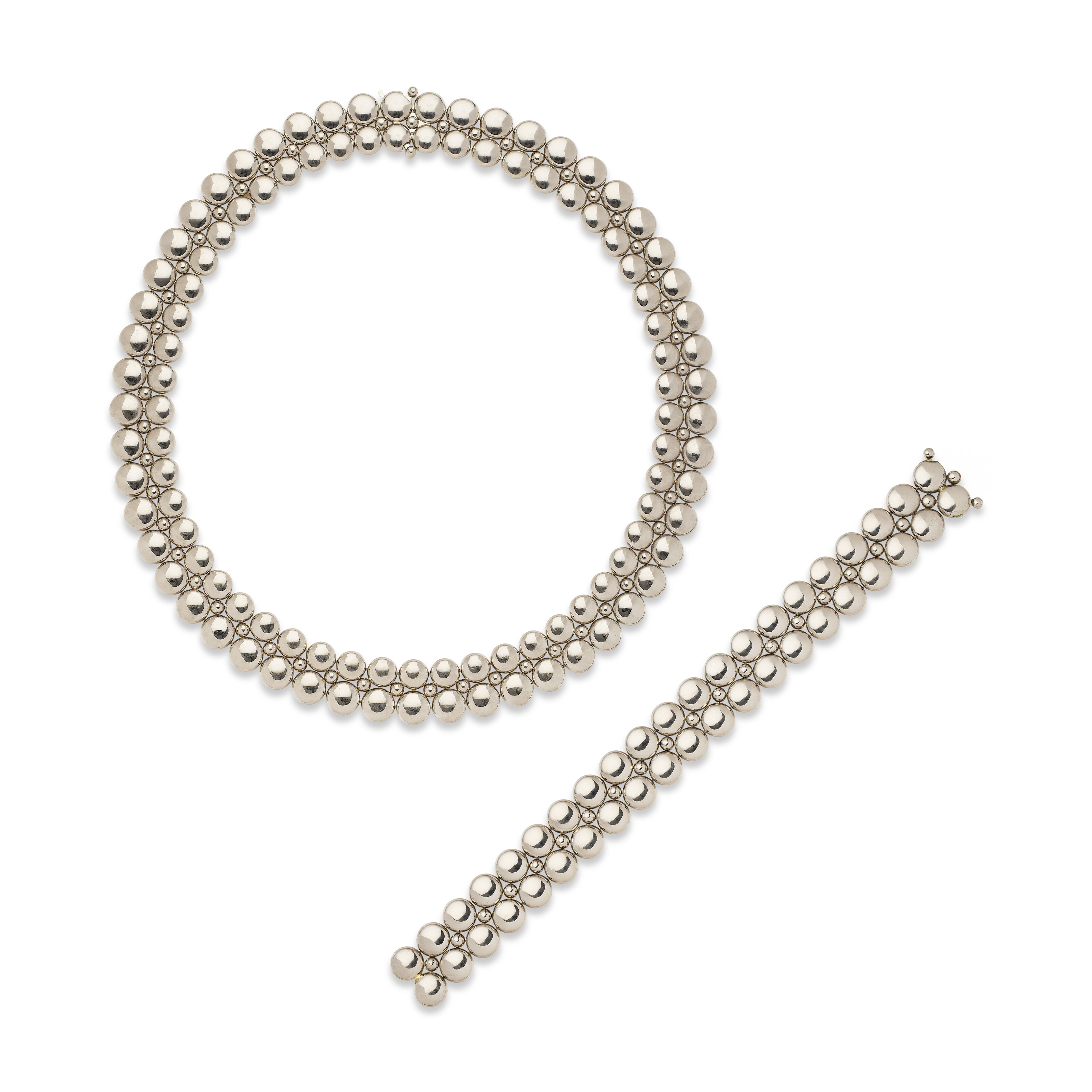 CARTIER DEMI-PARURE RÉVERSIBLE OR 'HONEYMOON', | Christie's