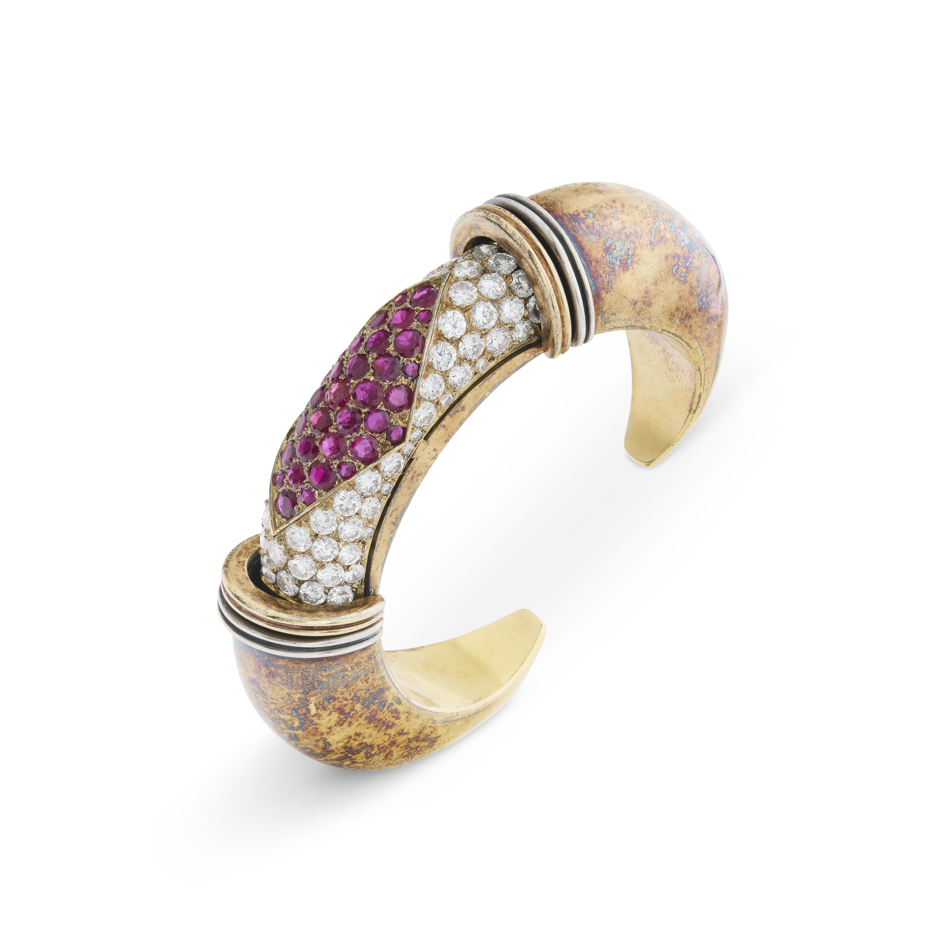 Rene Boivin. A ruby and diamond Cachettes bangle bracelet, 1976, offered in Joaillerie Paris until 17 December 2025 at Christie's Online