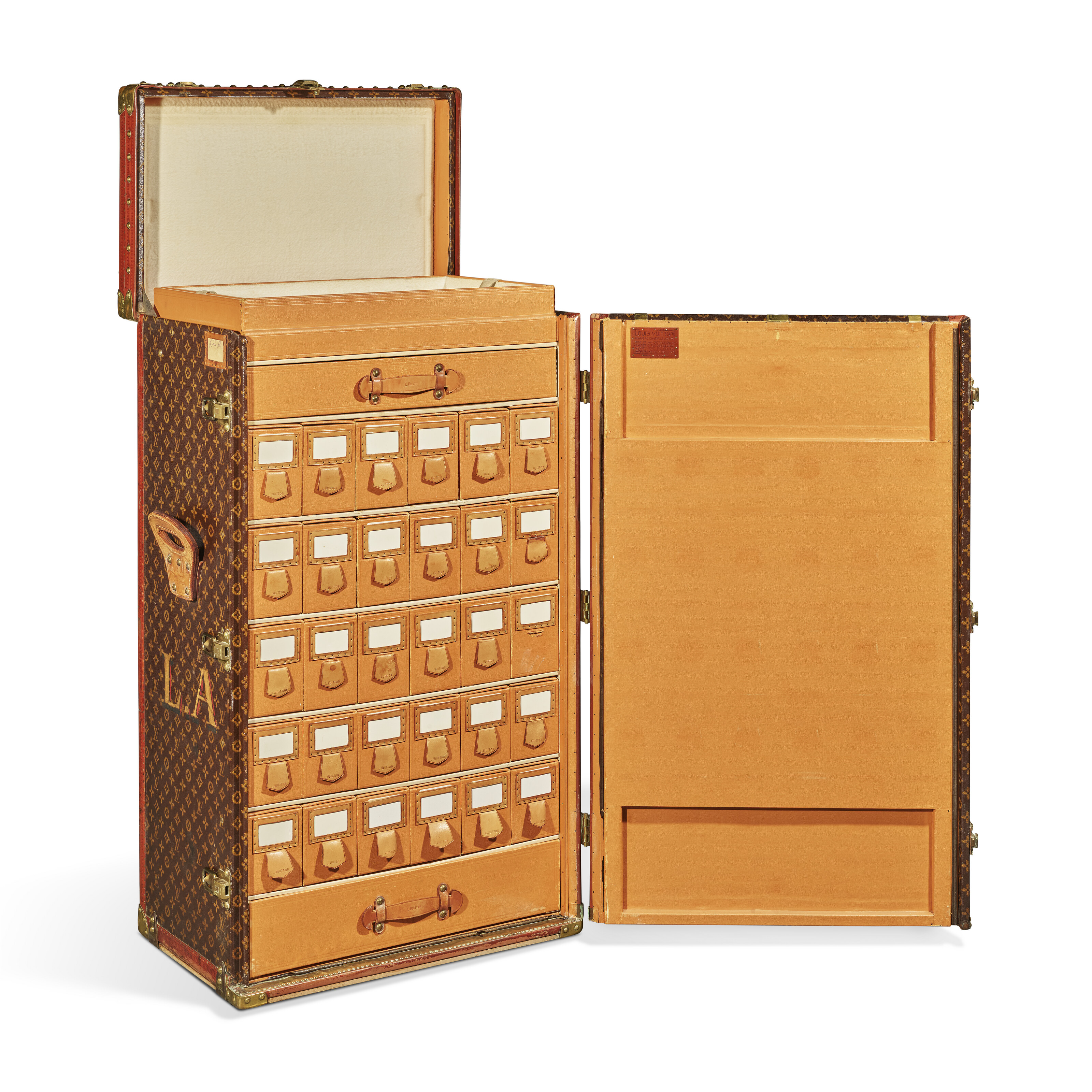 A monogram canvas desk trunk for 30 pairs of shoes with brass hardware, Louis Vuitton, 1929, offered in Legendary Trunks: A European Private Collection Part II, until 1 July 2025 at Christie's Online