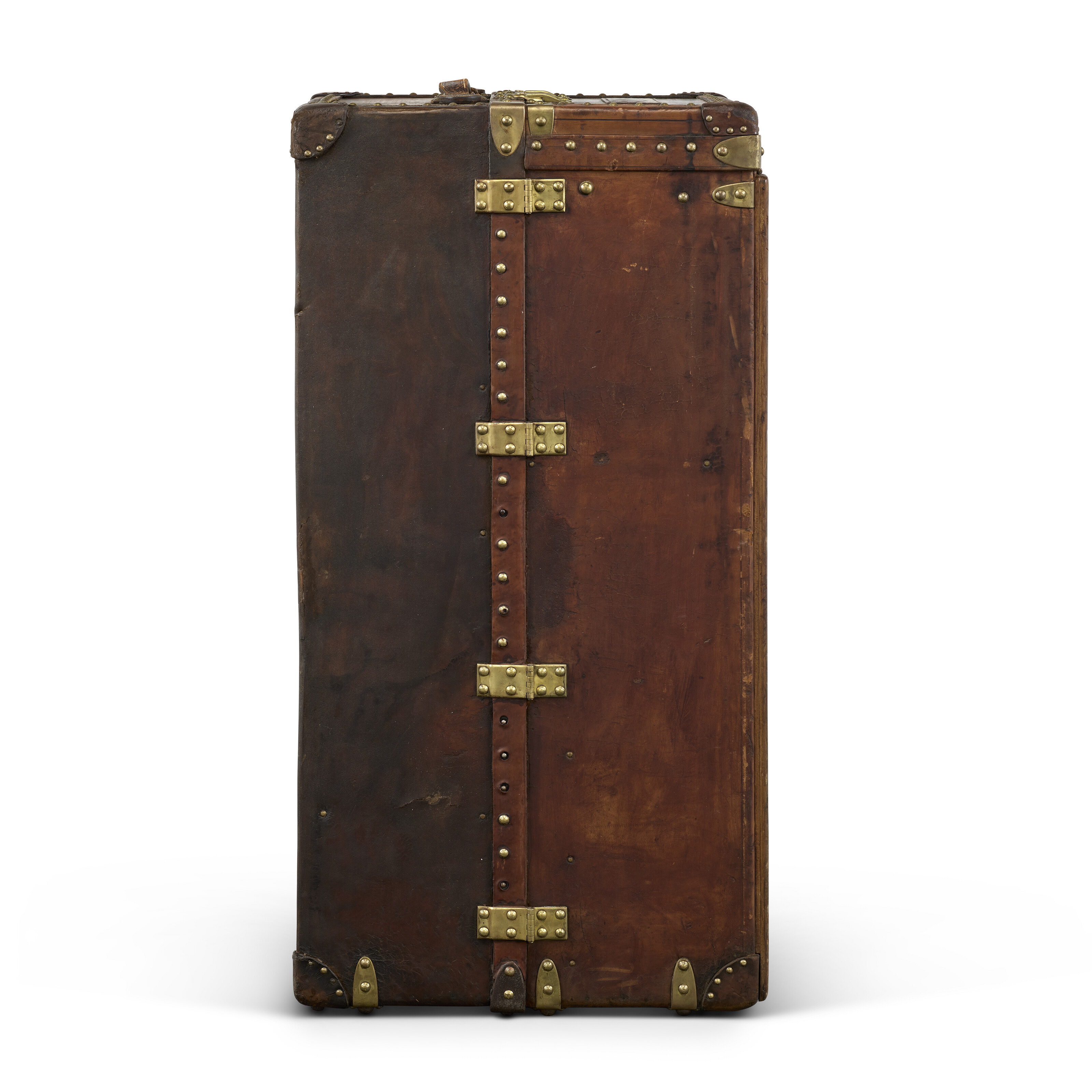 A NATURAL COWHIDE LEATHER WARDROBE TRUNK WITH BRASS HARDWARE