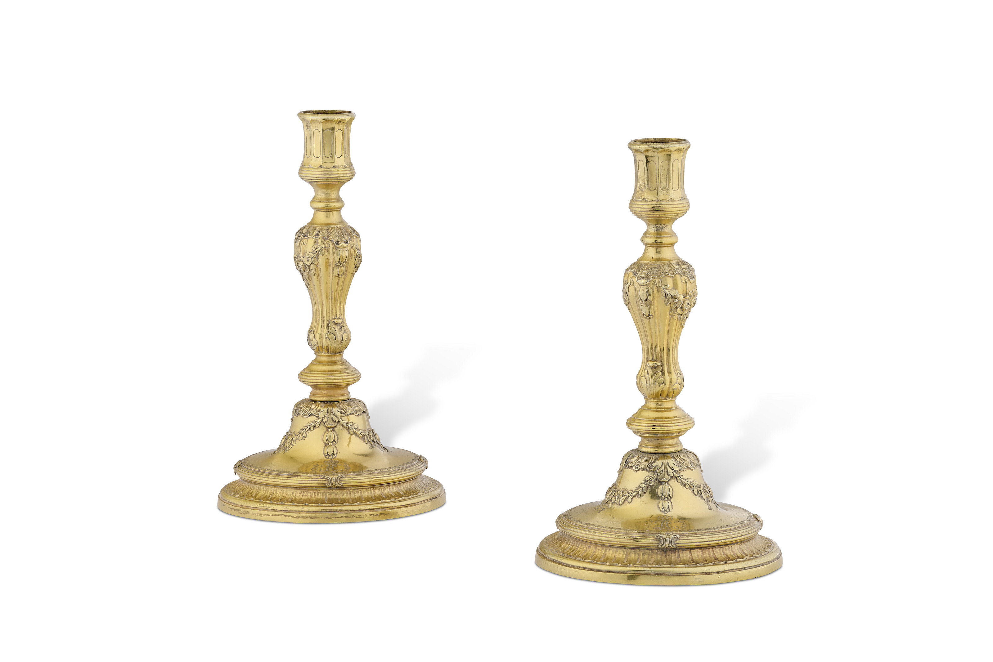 A pair of Louis XV silver-gilt candlesticks. Mark of Johannes Jacob Kirstein, Strasbourg, 1775, offered in Les Stern: une famille de collectionneurs - the Online Sale until 12 December 2025 at Christie's Online