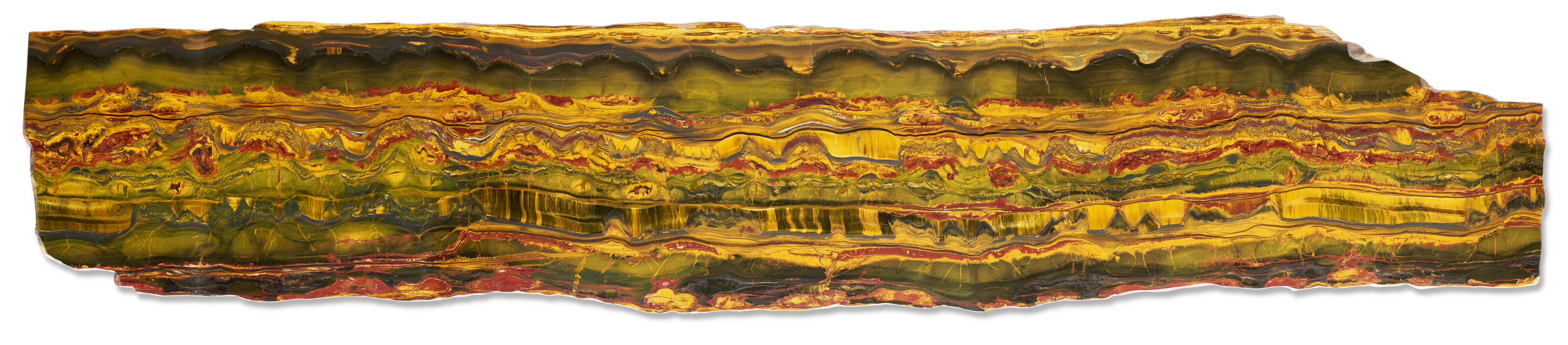 A monumental slice of banded Marra Mamba Tiger Eye. Mt Brockman Station, Western Australia. From the early Proterozoic (circa 2.5 billion years ago), offered in Ancient Wonders: Antiquities and Natural History, until 1 July 2026 at Christie's Online