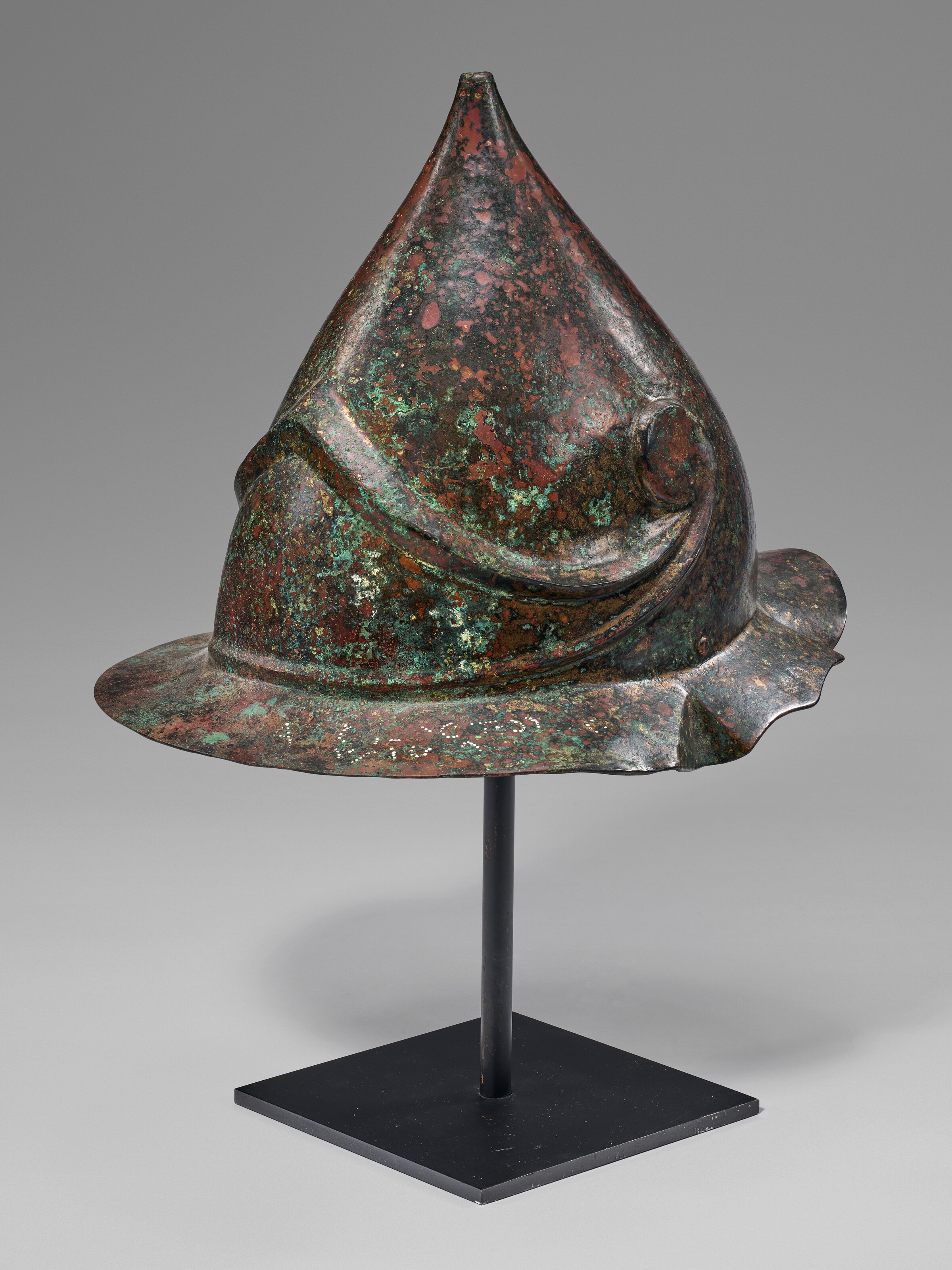 A Greek bronze helmet of Boeotian type, Magna Graecia, Hellenistic period, circa 3rd-2nd century B.C., offered in Ancient Wonders: Antiquities and Natural History, until 1 July 2026 at Christie's Online