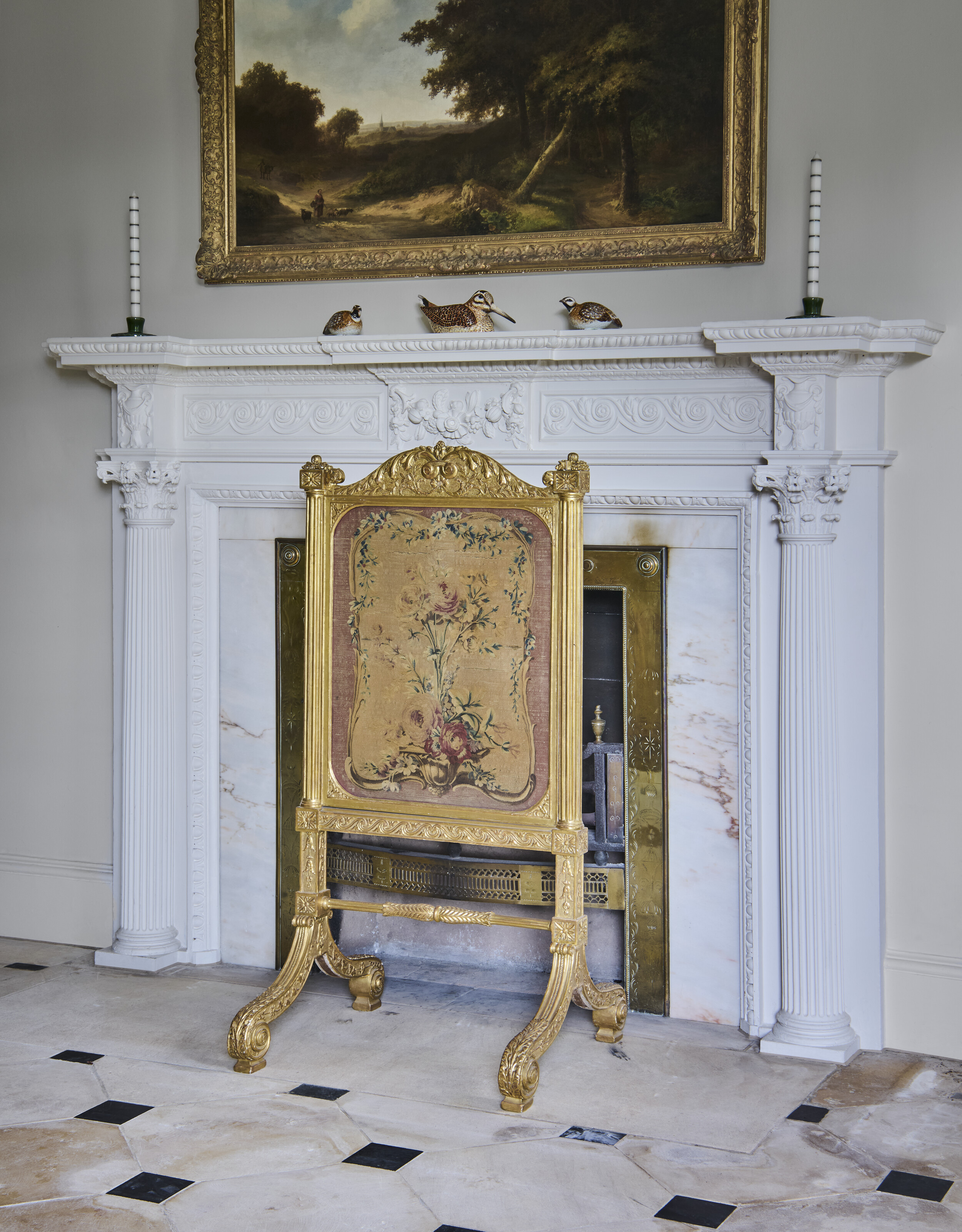 A PAIR OF REGENCY GILTWOOD CHEVAL FIRESCREENS