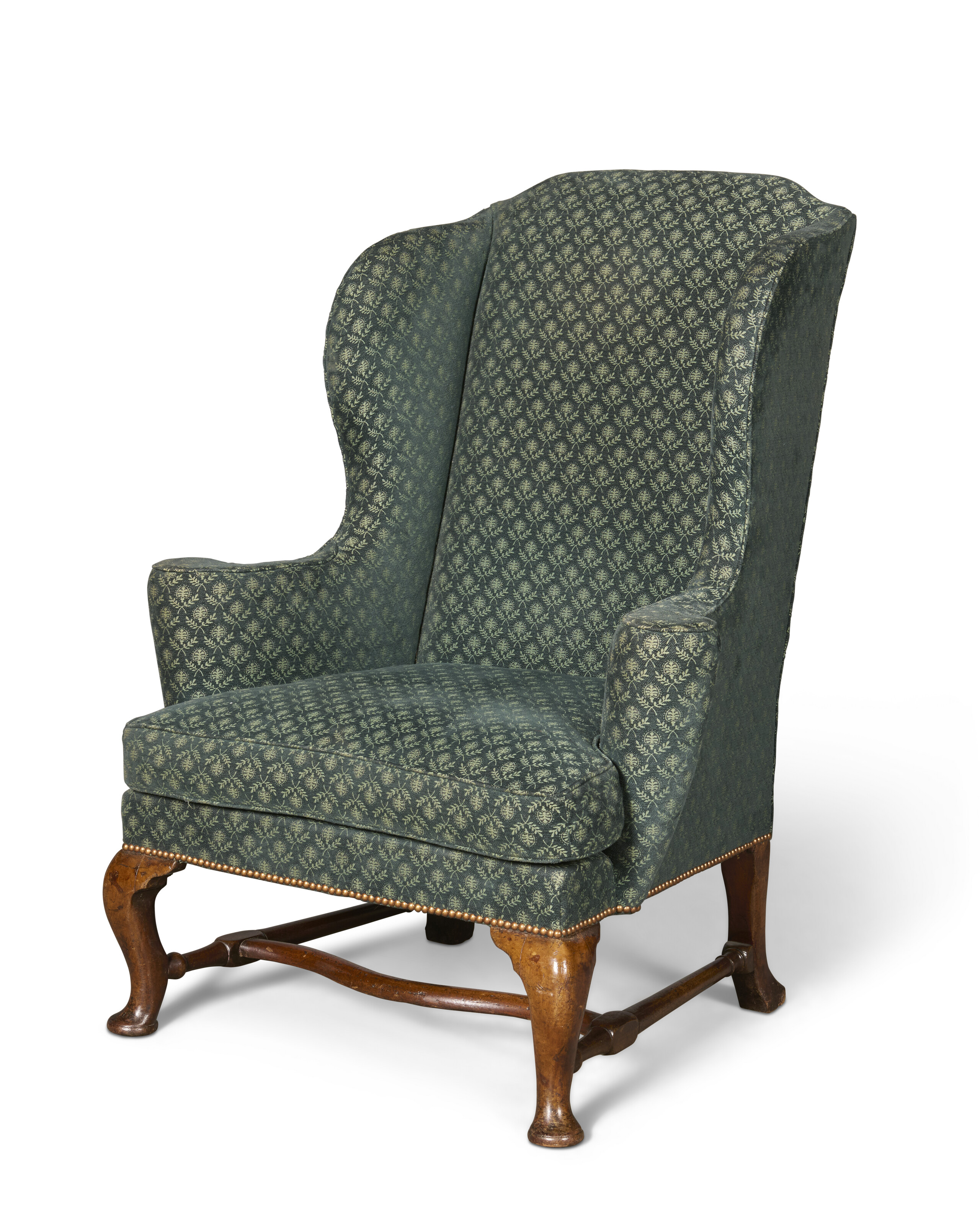 A GEORGE II WALNUT WING BACK ARMCHAIR