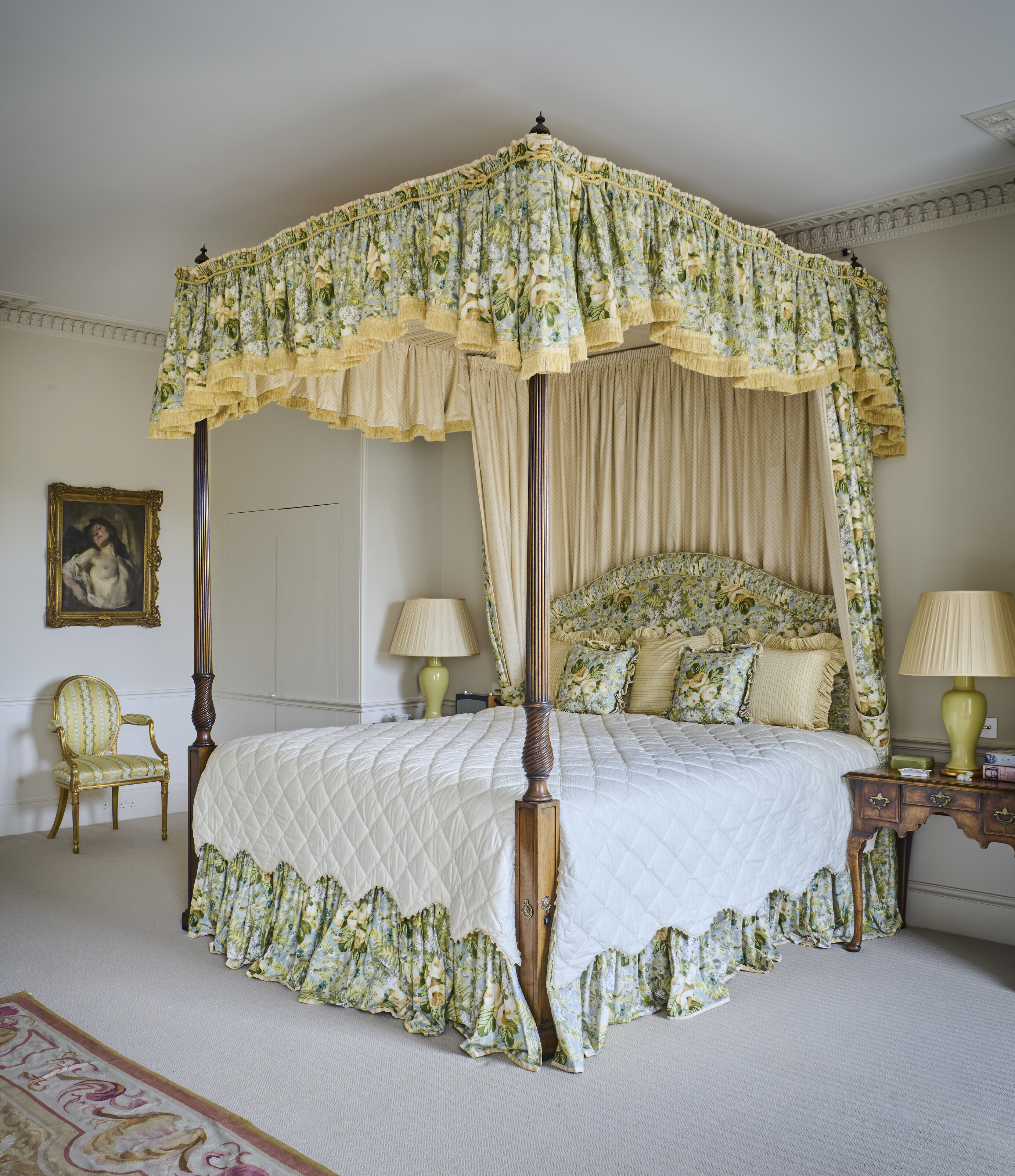 A GEORGE III STYLE MAHOGANY FOUR-POST BEDSTEAD