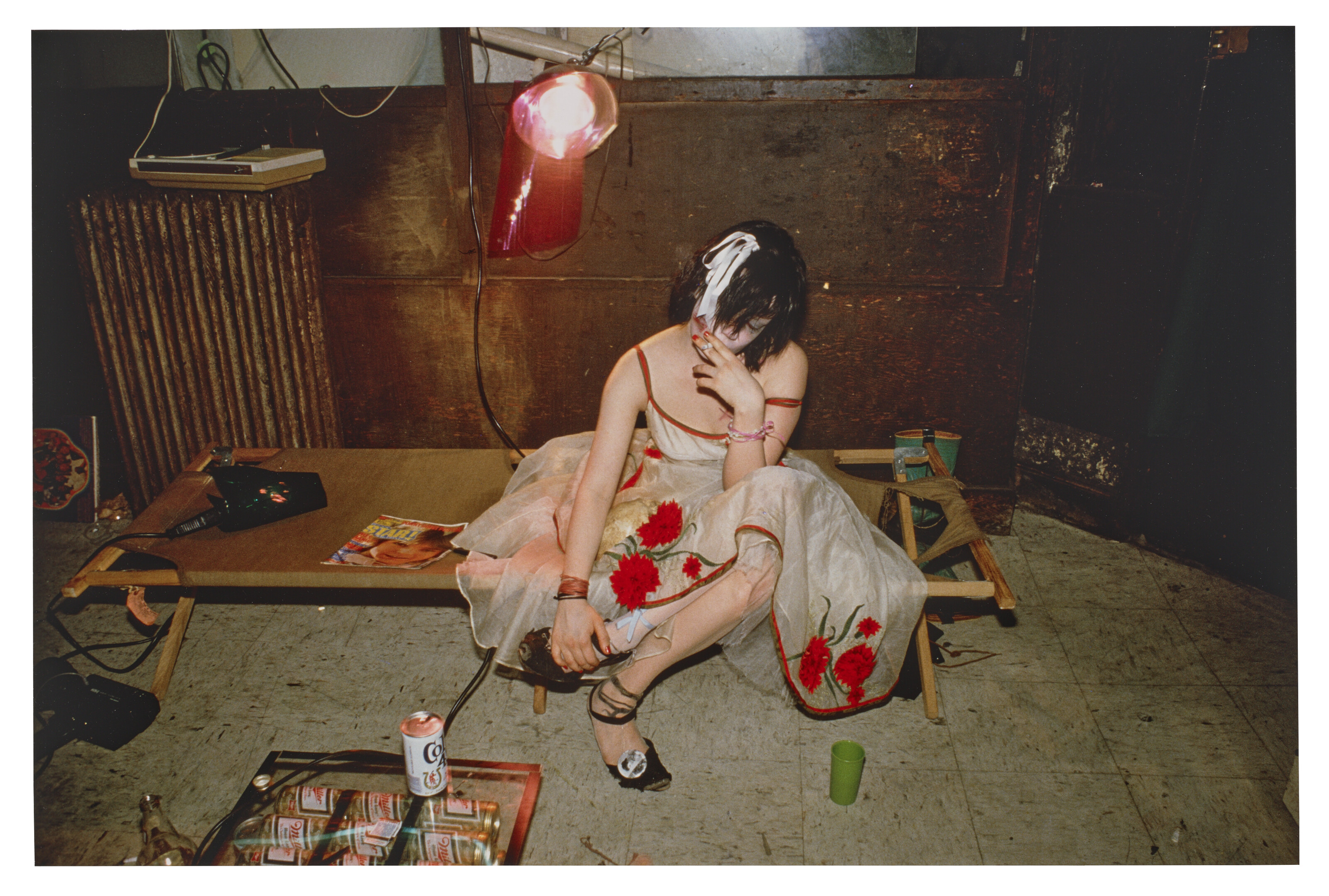 NAN GOLDIN (B. 1953), Trixie on the cot, NYC, 1979 | Christie's