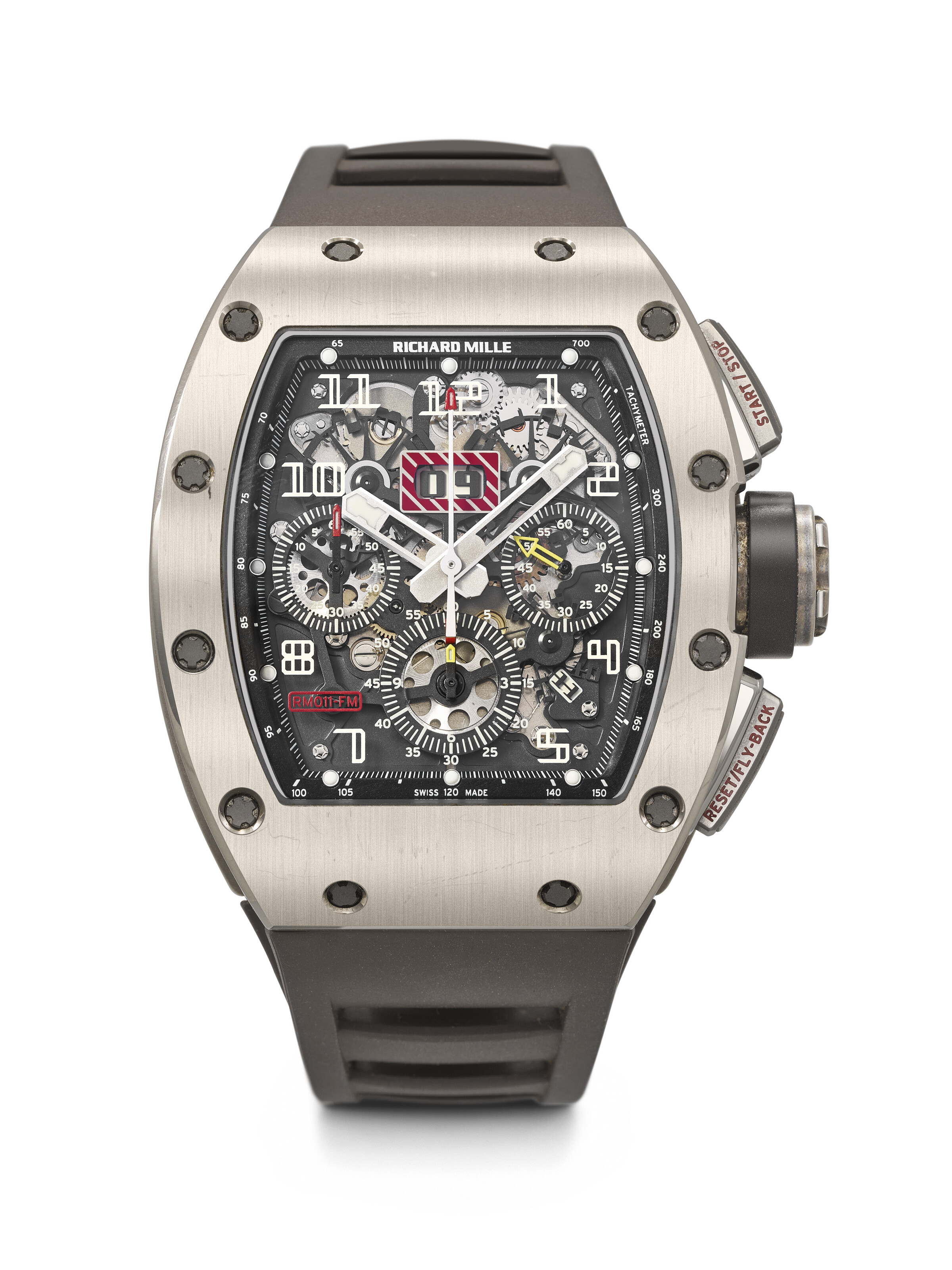Richard Mille. A sporty titanium and 18k white gold tonneau-shaped semi-skeletonised automatic annual calendar flyback chronograph wristwatch, offered in Rare Watches Including Watches for ELA on 9 November 2026 at Christie's in Geneva
