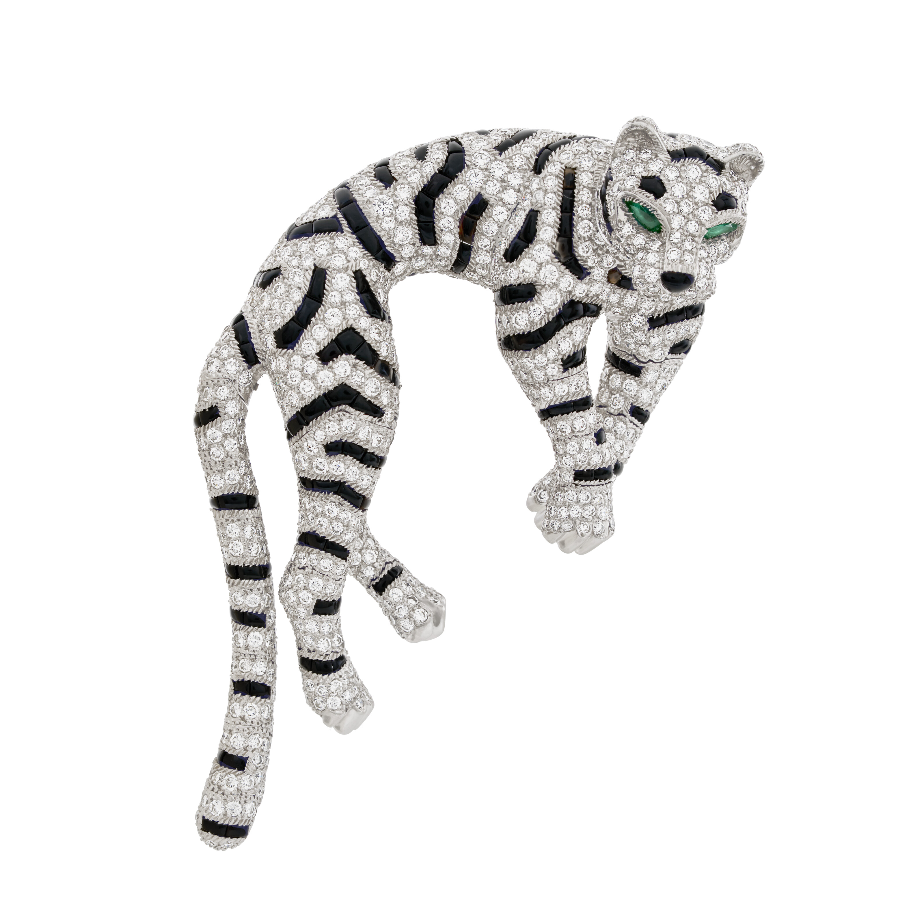 A Cartier diamond, onyx and emerald 'Tigre' clip-brooch, offered in Exceptional Jewels and Objects of Elegance: A Connoisseur's Collection - part I on 10 November 2026 at Christie's in Geneva