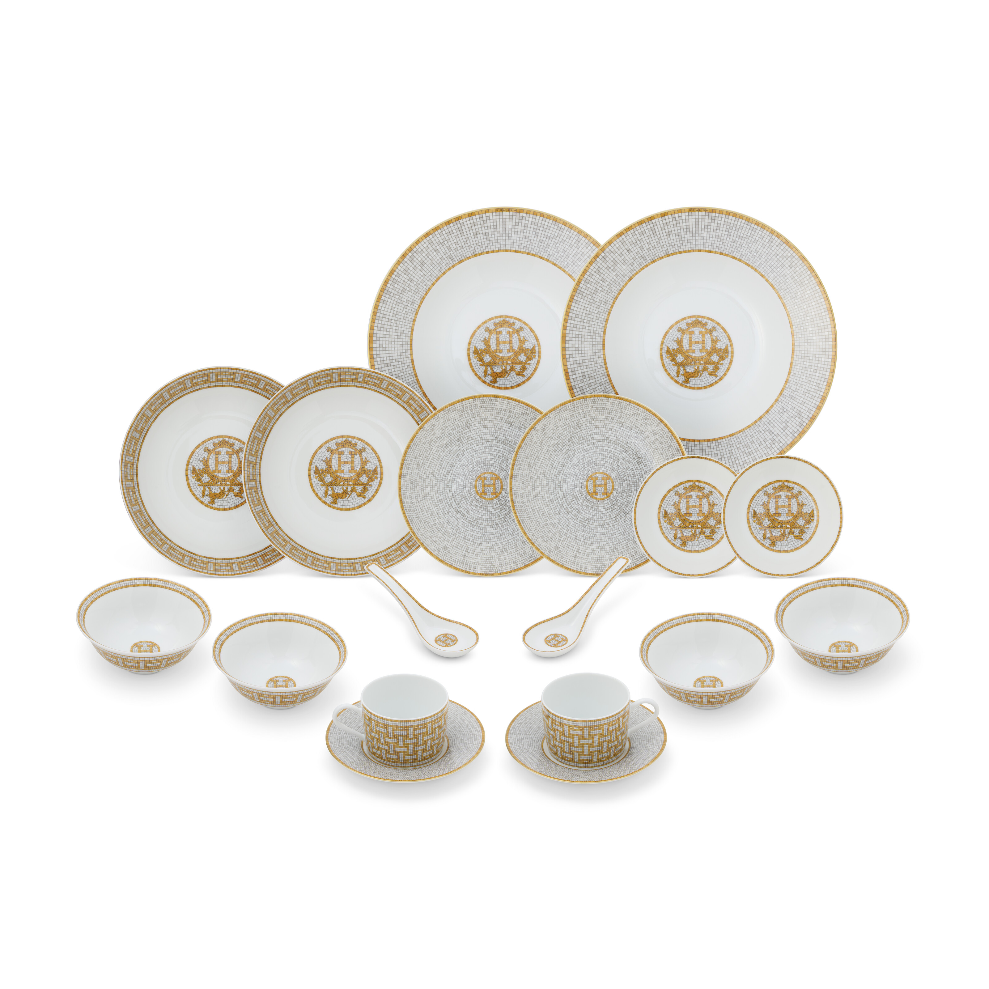 A SET OF EIGHTEEN: MOSAÏQUE AU 24 GOLD PORCELAIN SET, HERMÈS, 2025