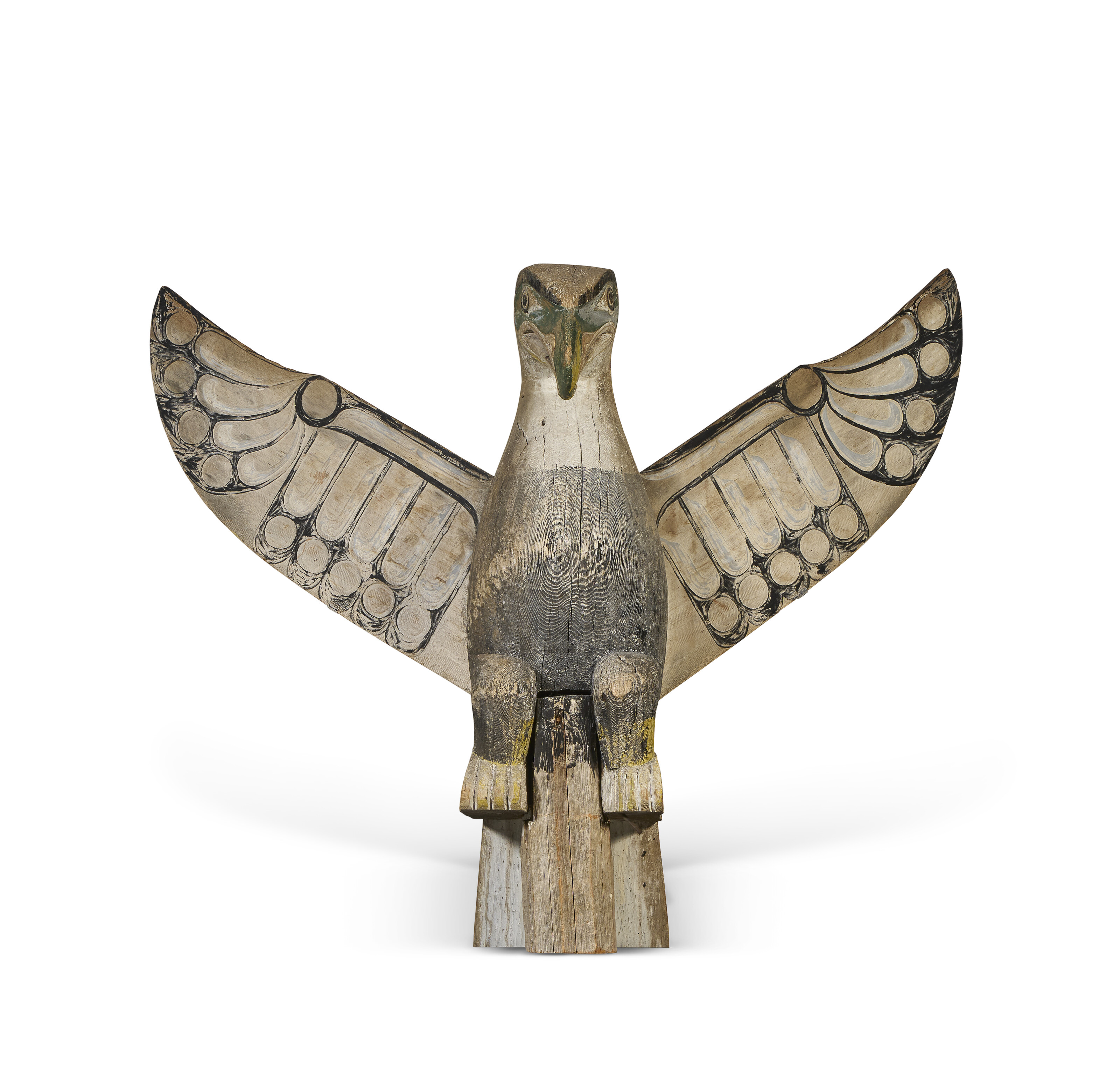 A KWAKIUTL POLYCHROME PAINT-DECORATED CARVED WOOD MODEL EAGLE