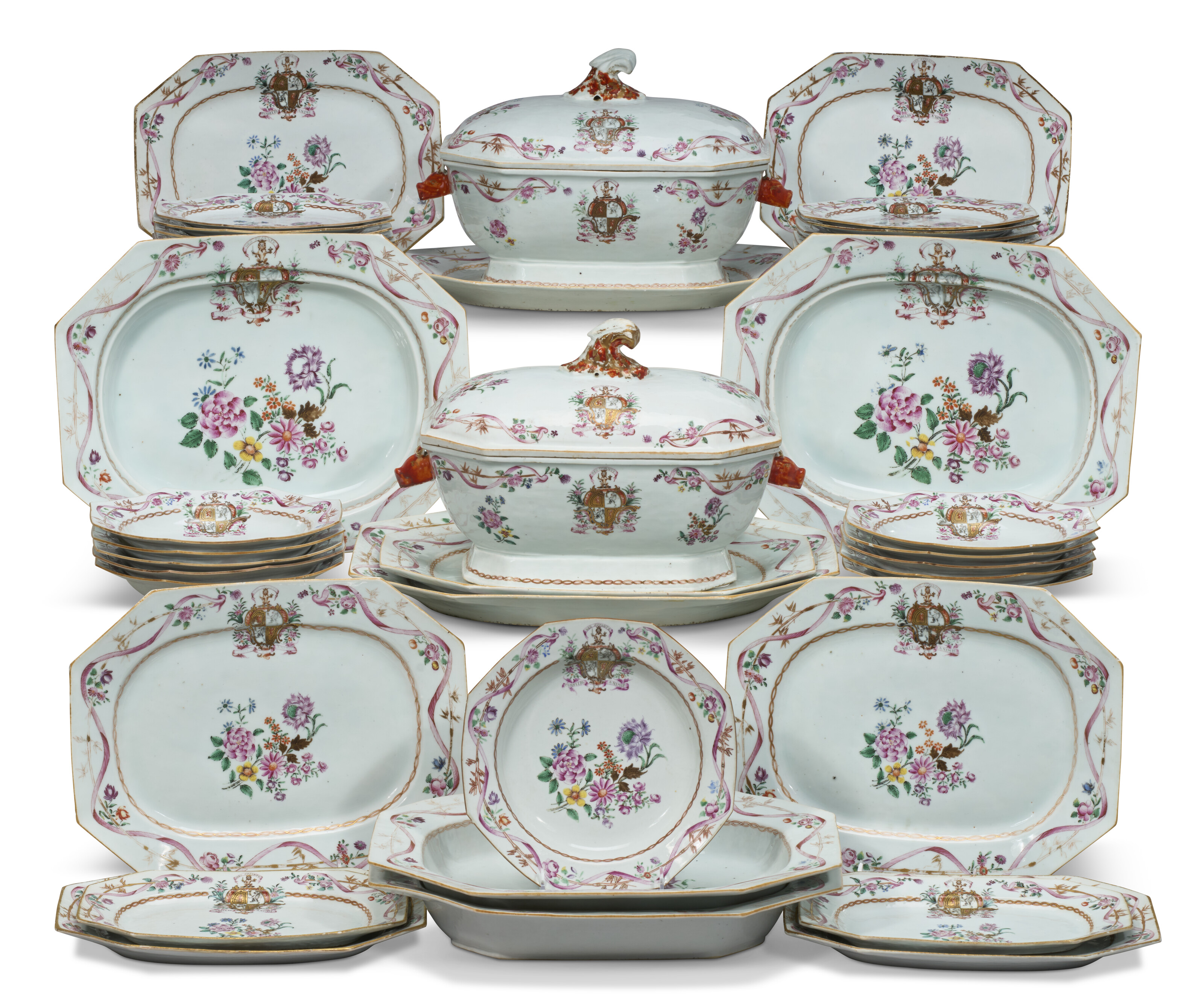 A CHINESE EXPORT PORCELAIN FAMILLE ROSE ARMORIAL PART DINNER
