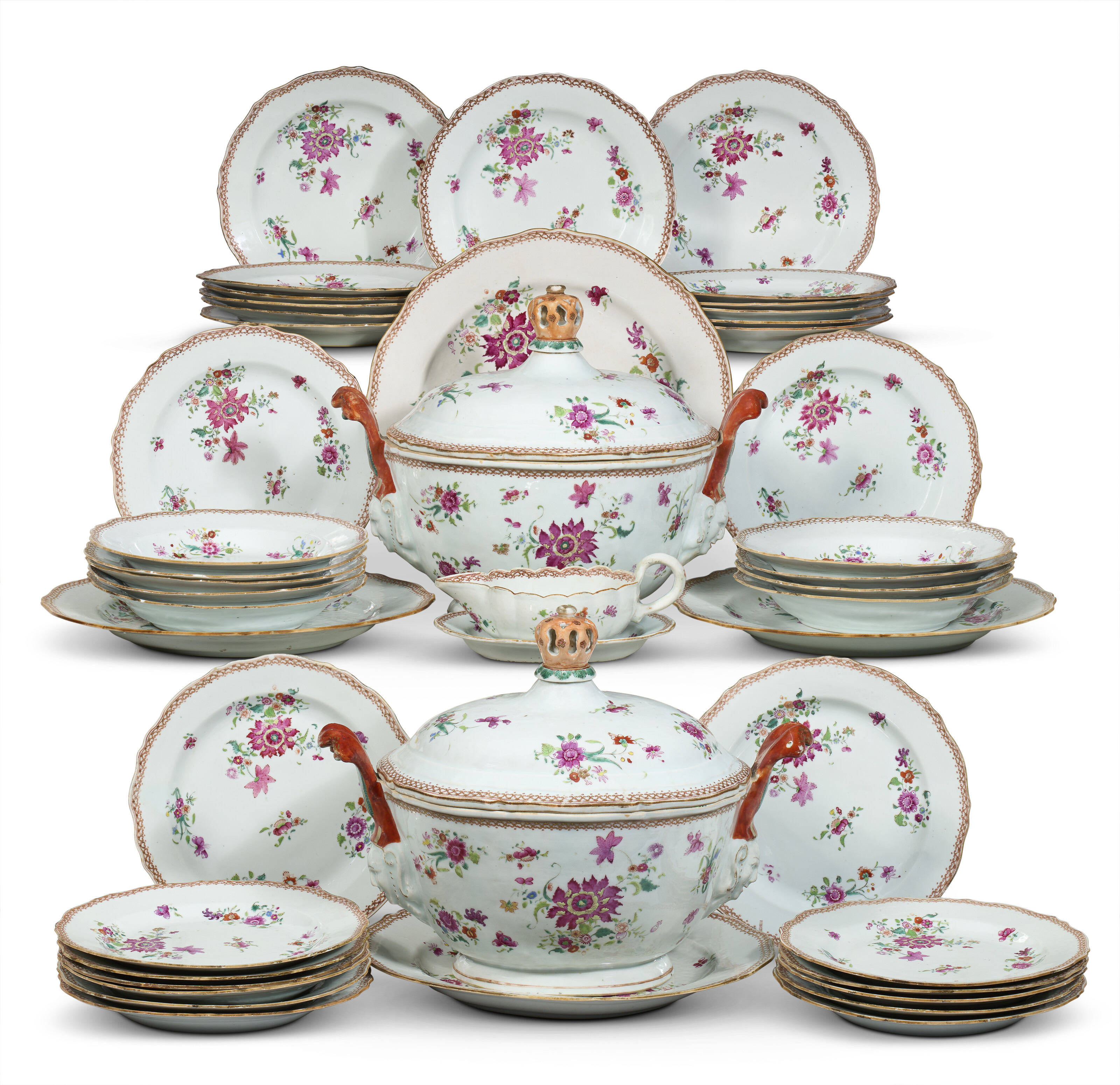 A CHINESE EXPORT PORCELAIN FAMILLE ROSE ARMORIAL PART DINNER