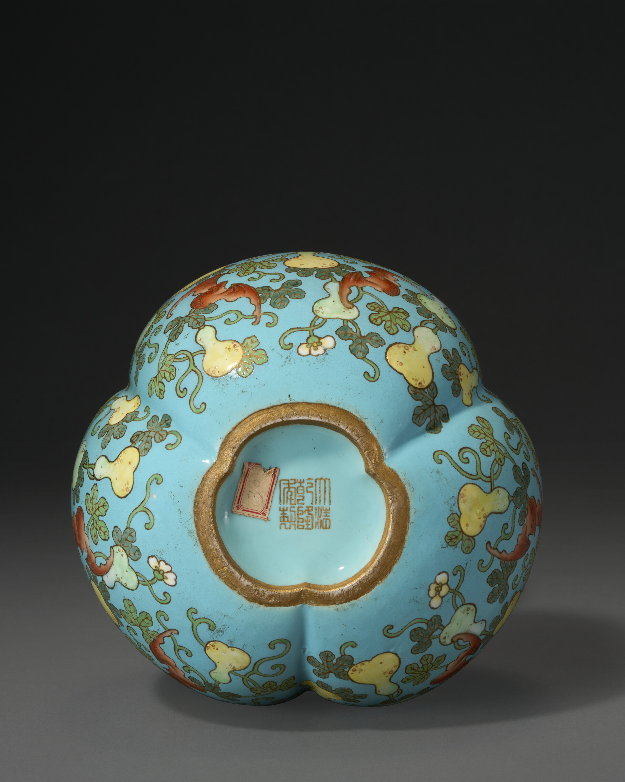 AN EXCEPTIONALLY RARE TURQUOISE-GROUND FAMILLE ROSE DOUBLE GOURD