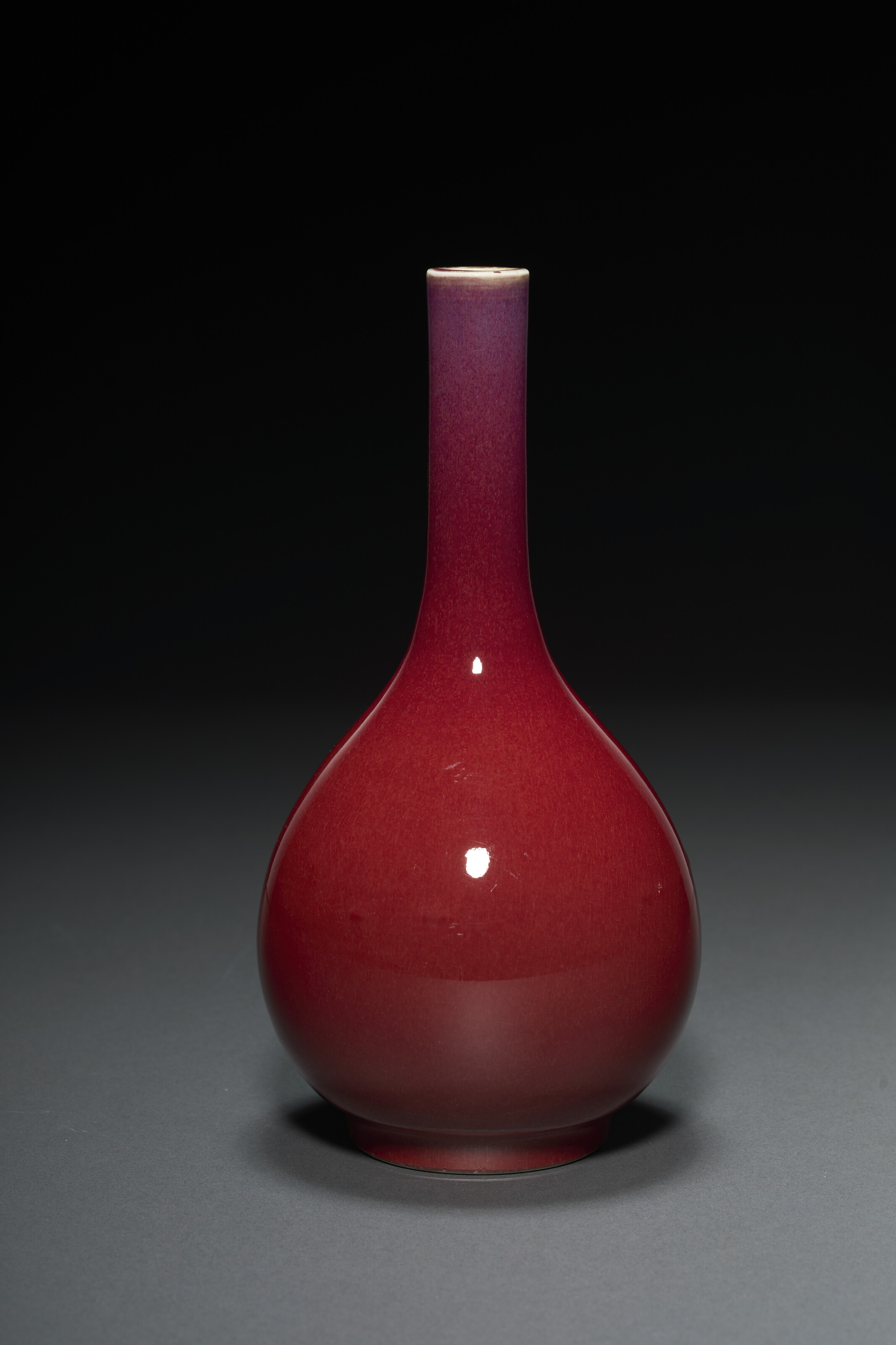 A SMALL FLAMBÉ-GLAZED BOTTLE VASE, CHINA, 18TH-19TH CENTURY | Christie’s