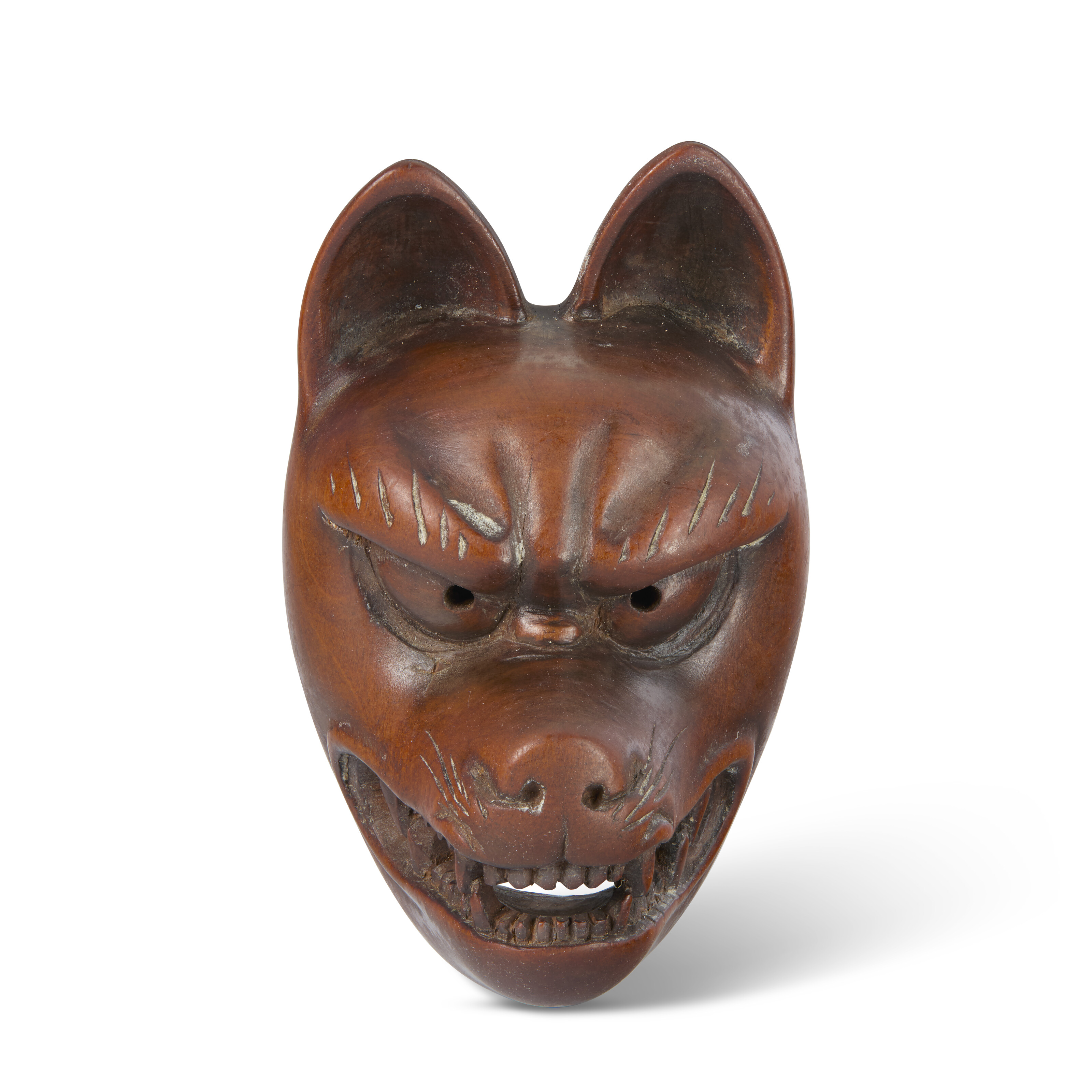 A CARVED WOOD SCULPTURE NETSUKE OF A FOX MASK, JAPAN, EDO PERIOD