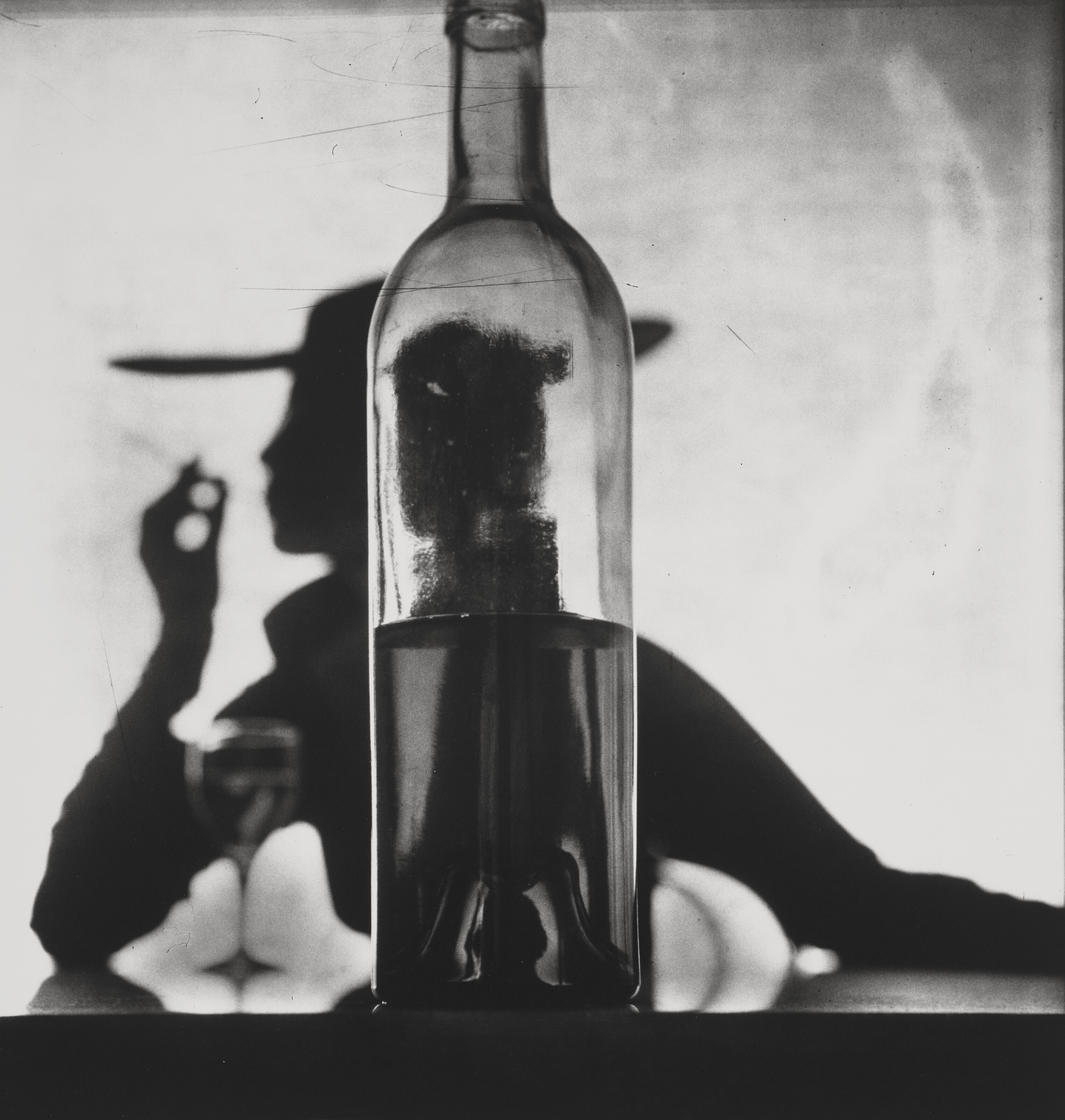 IRVING PENN (1917–2009), Girl Behind Bottle Jean Patchett, New