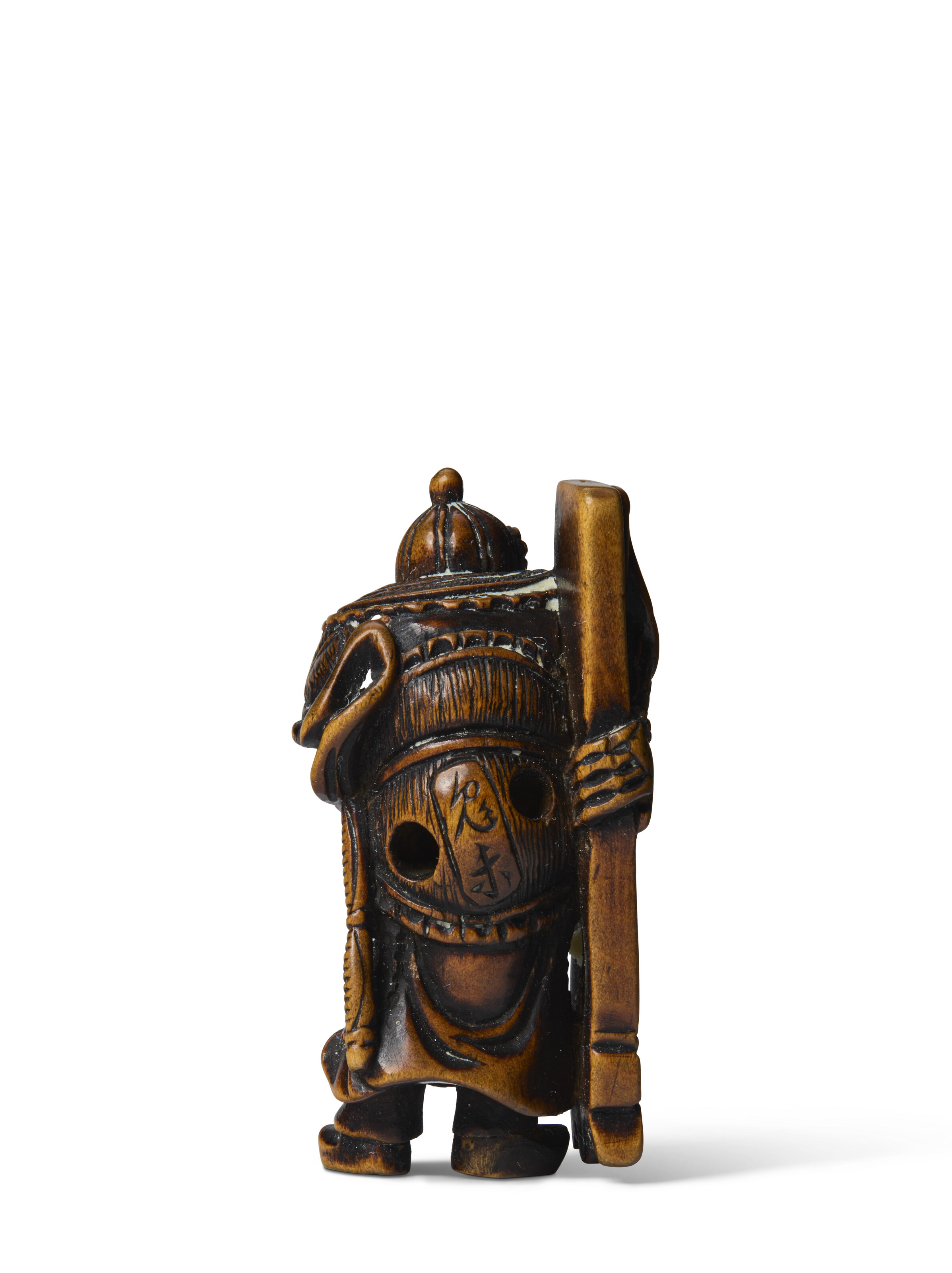 A CARVED WOOD NETSUKE OF HAN KAI (FAN KUAI) CARRYING A SHIELD, EDO