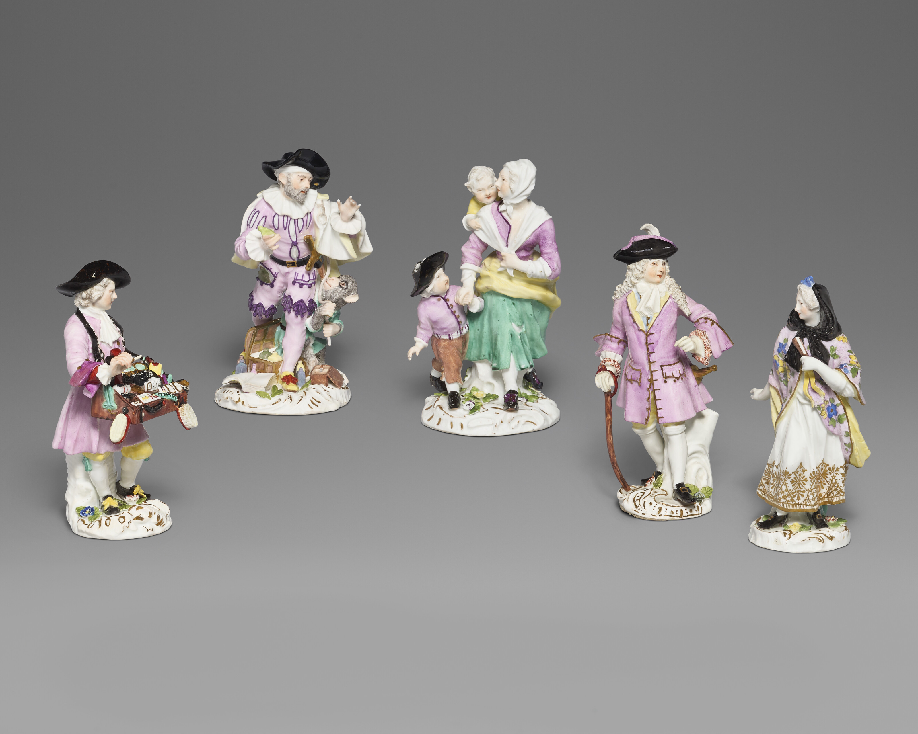 TWO MEISSEN PORCELAIN MALE 'CRIS DE PARIS' FIGURES OF ENTERTAINERS