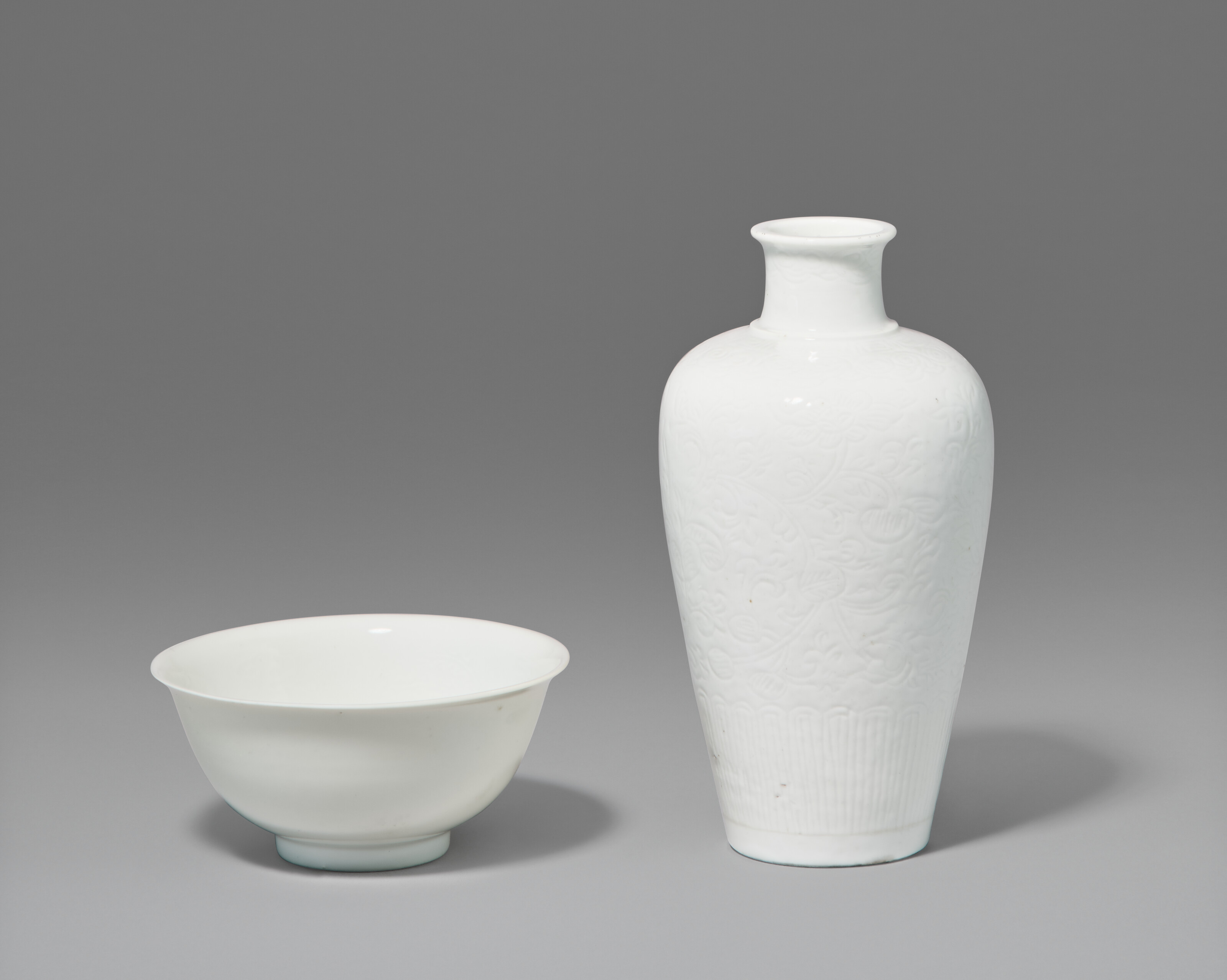 TWO WHITE-GLAZED VESSELS