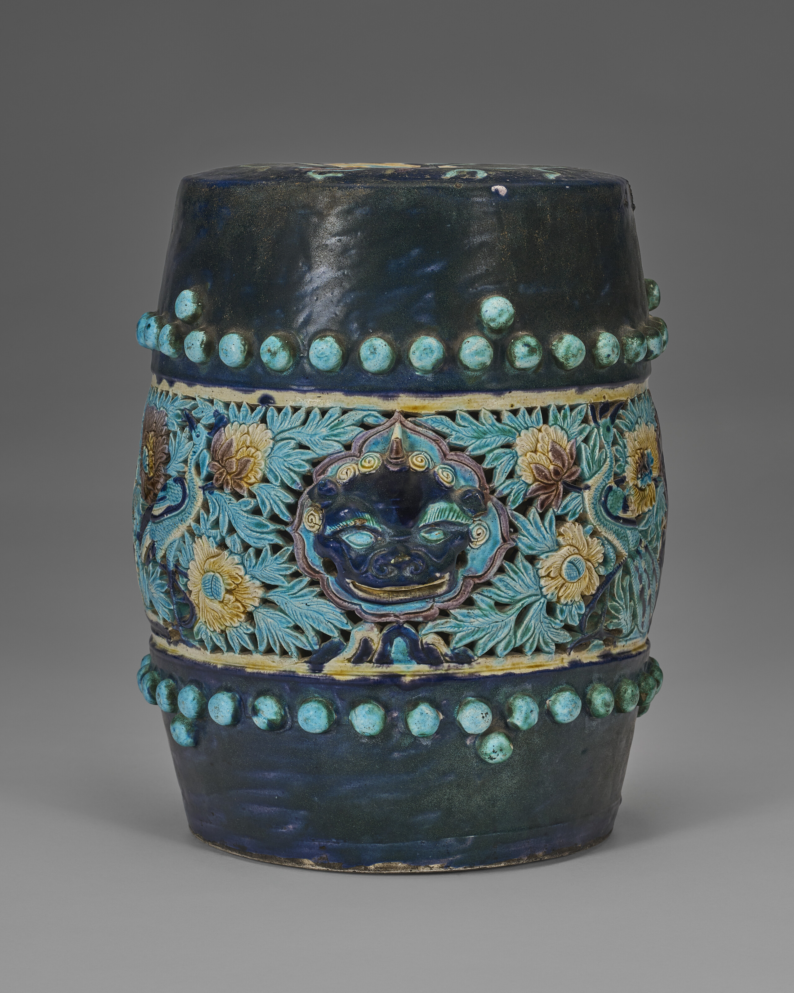 A FAHUA RETICULATED BARREL-FORM STOOL